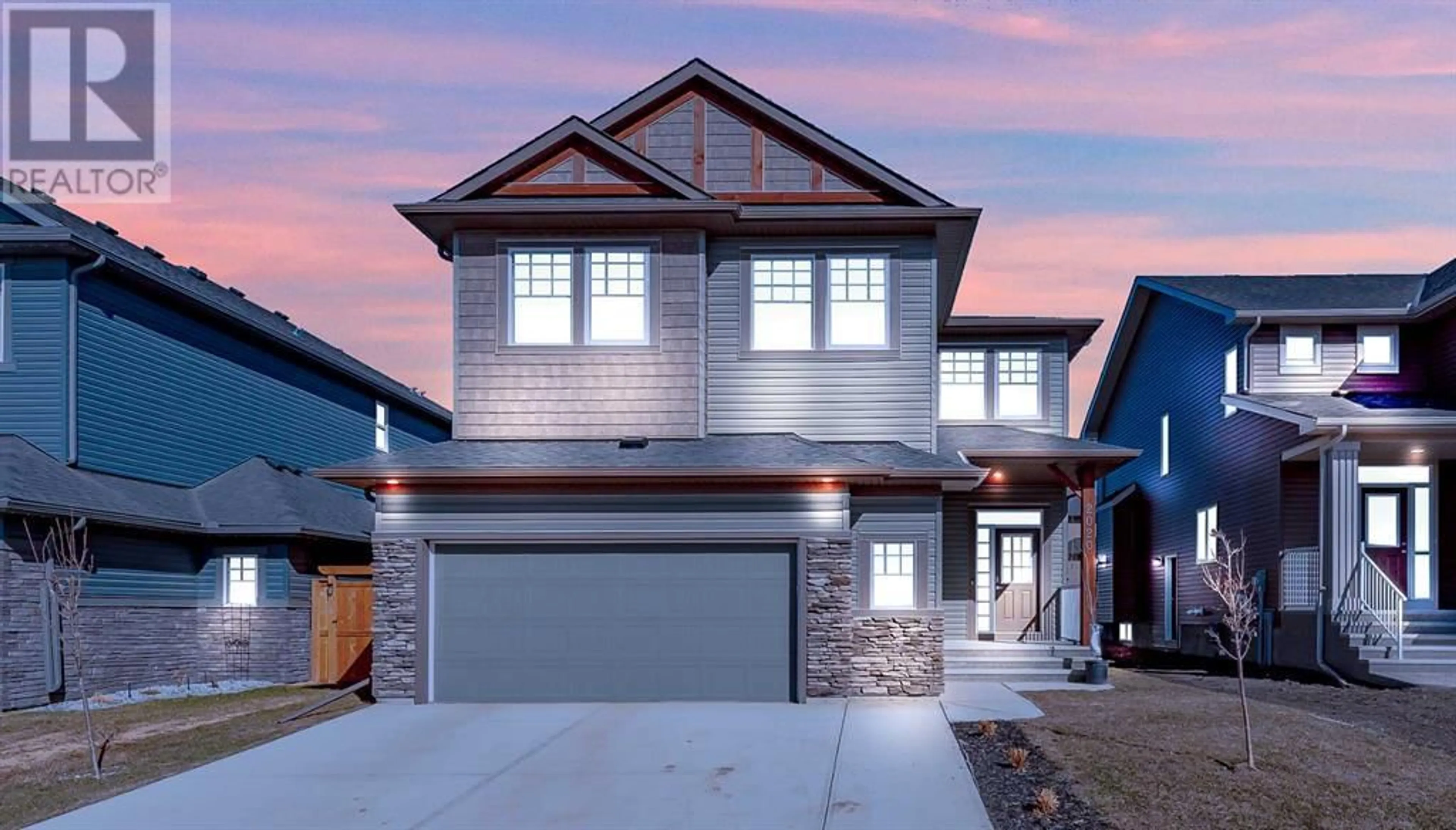 Frontside or backside of a home for 2020 Ravensdun Crescent SE, Airdrie Alberta T4A3K2