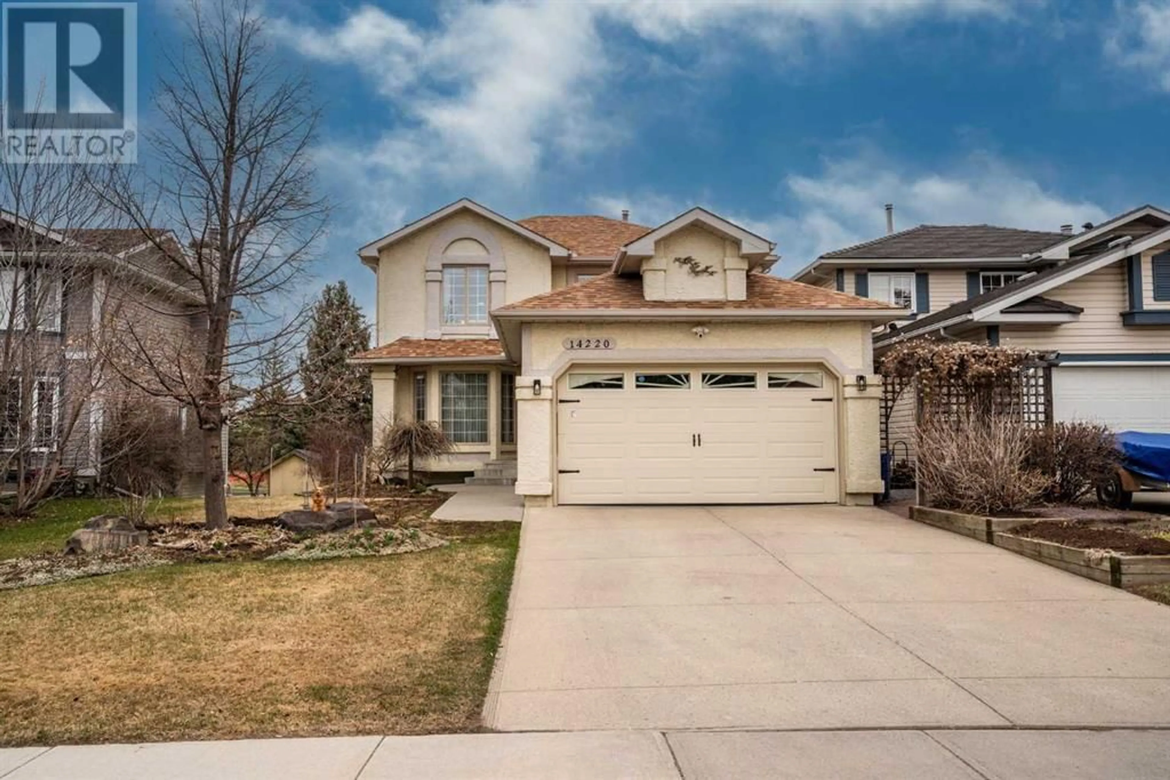 Frontside or backside of a home for 14220 Evergreen Street SW, Calgary Alberta T2Y2W9