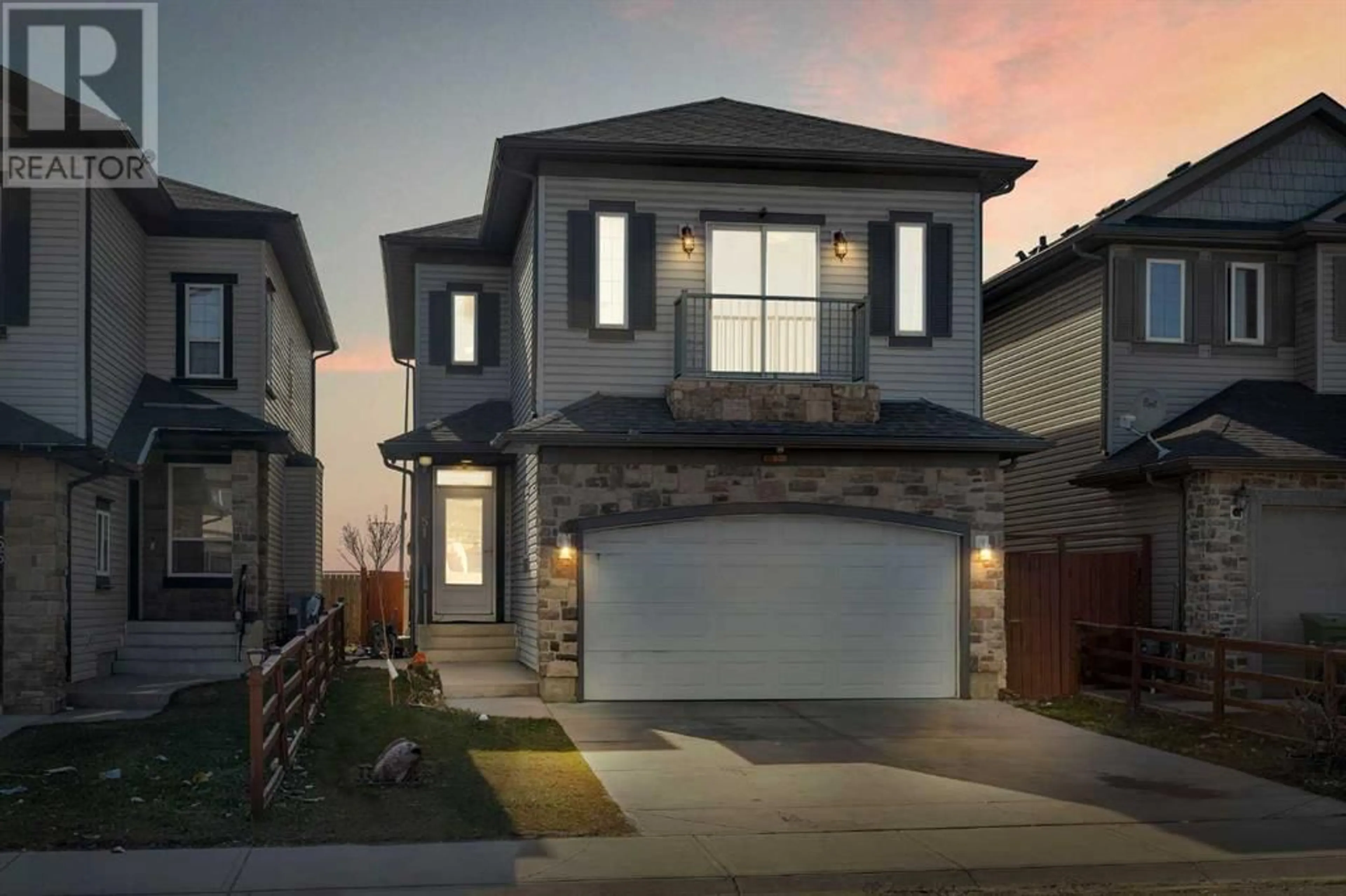 Frontside or backside of a home for 51 Taracove Estate Drive NE, Calgary Alberta T3J0K5