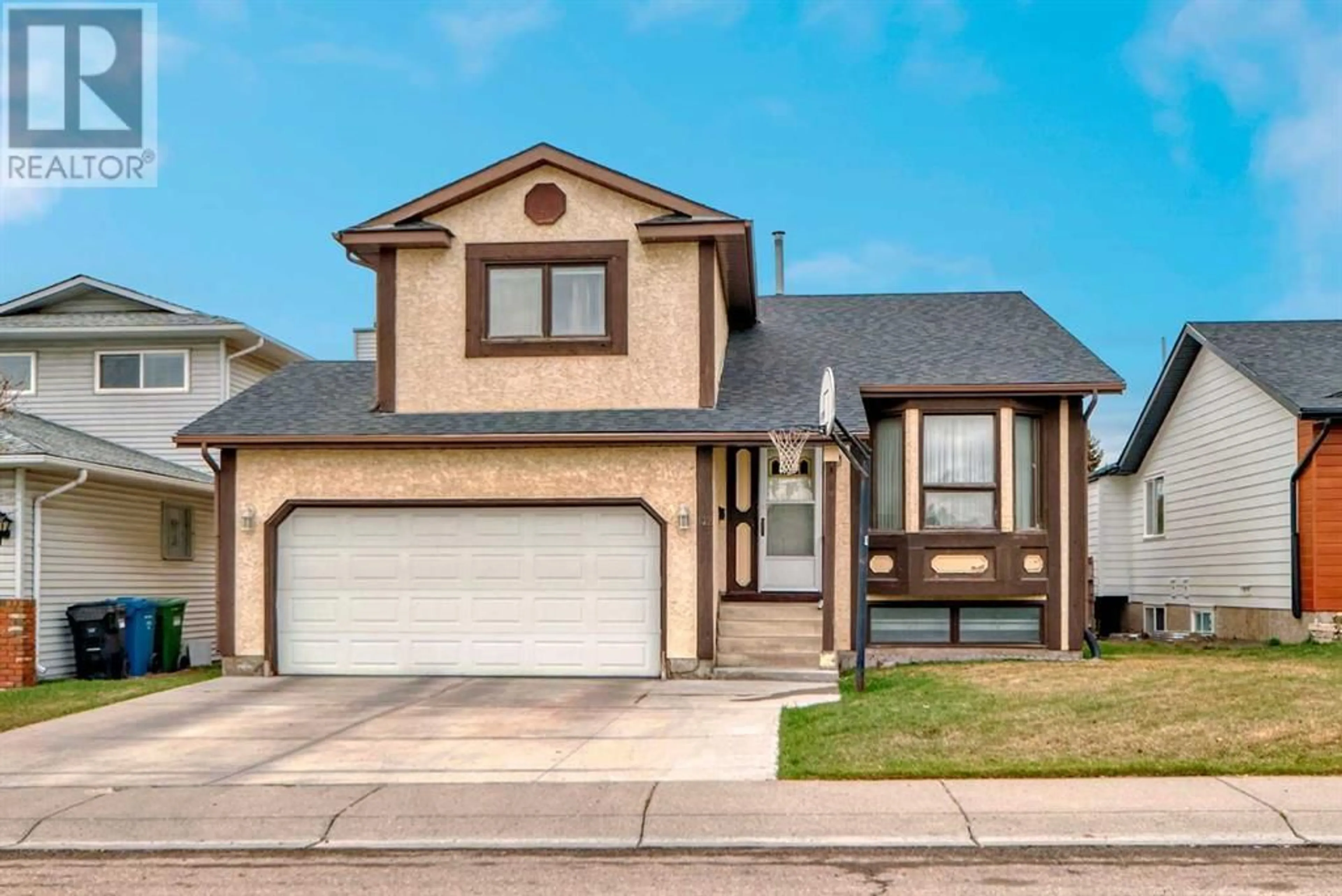 Frontside or backside of a home for 132 Whitlow Place NE, Calgary Alberta T1Y6J9