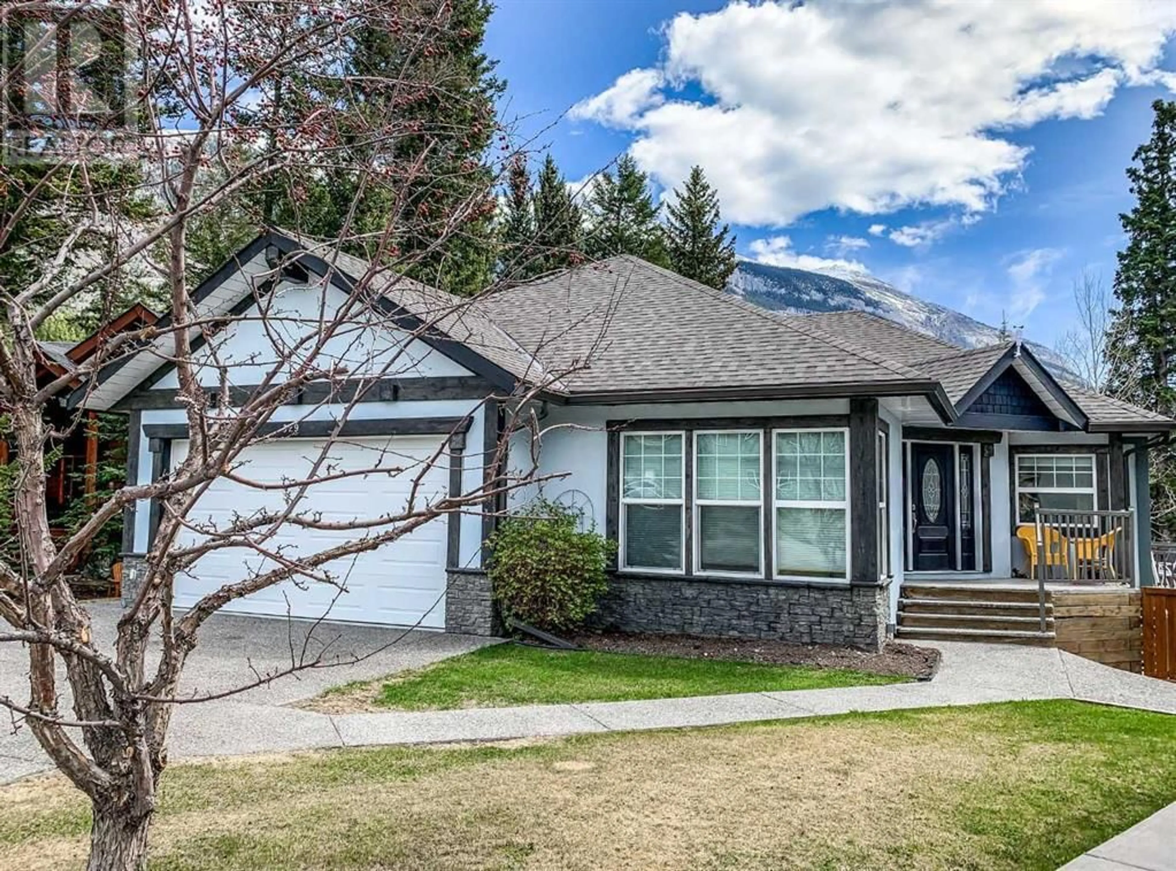 Frontside or backside of a home for 329 Canyon Close, Canmore Alberta T1W1H4