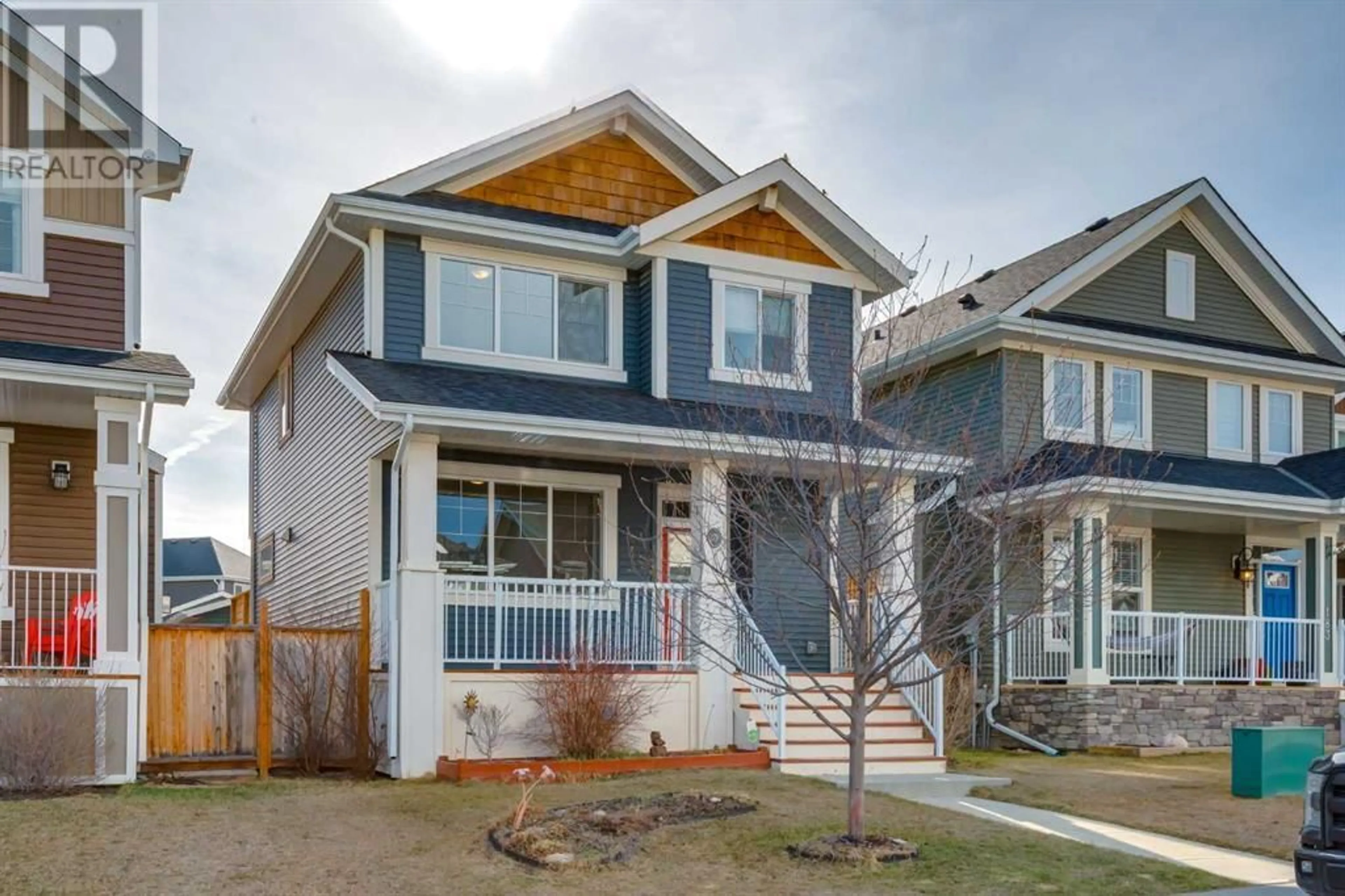 Frontside or backside of a home for 179 River Heights Crescent, Cochrane Alberta T4C0V1