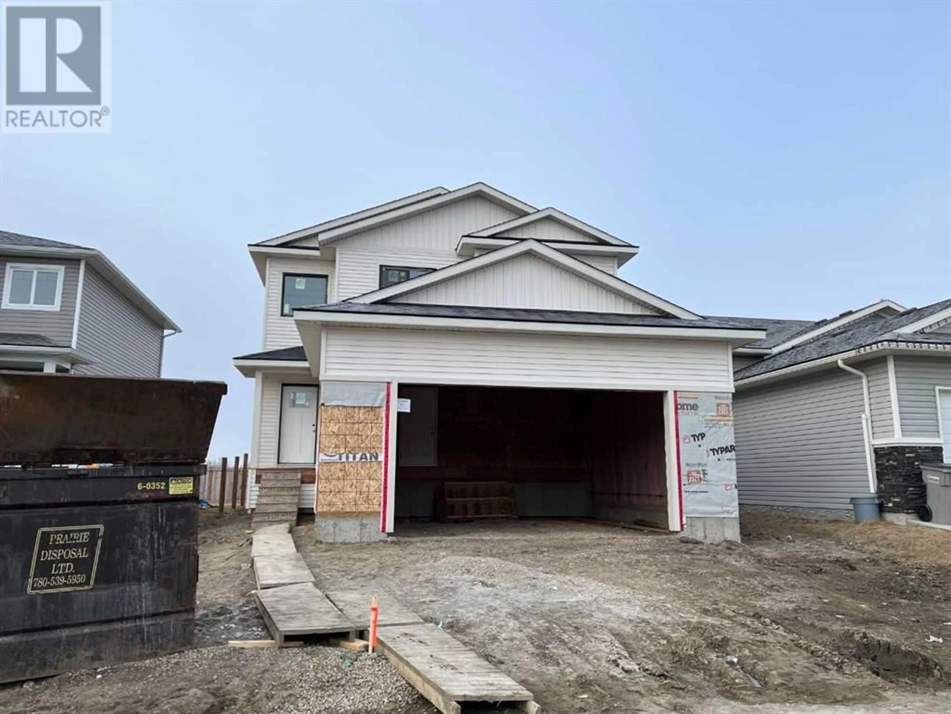 Frontside or backside of a home for 8701 122 Avenue, Grande Prairie Alberta T8X0P7