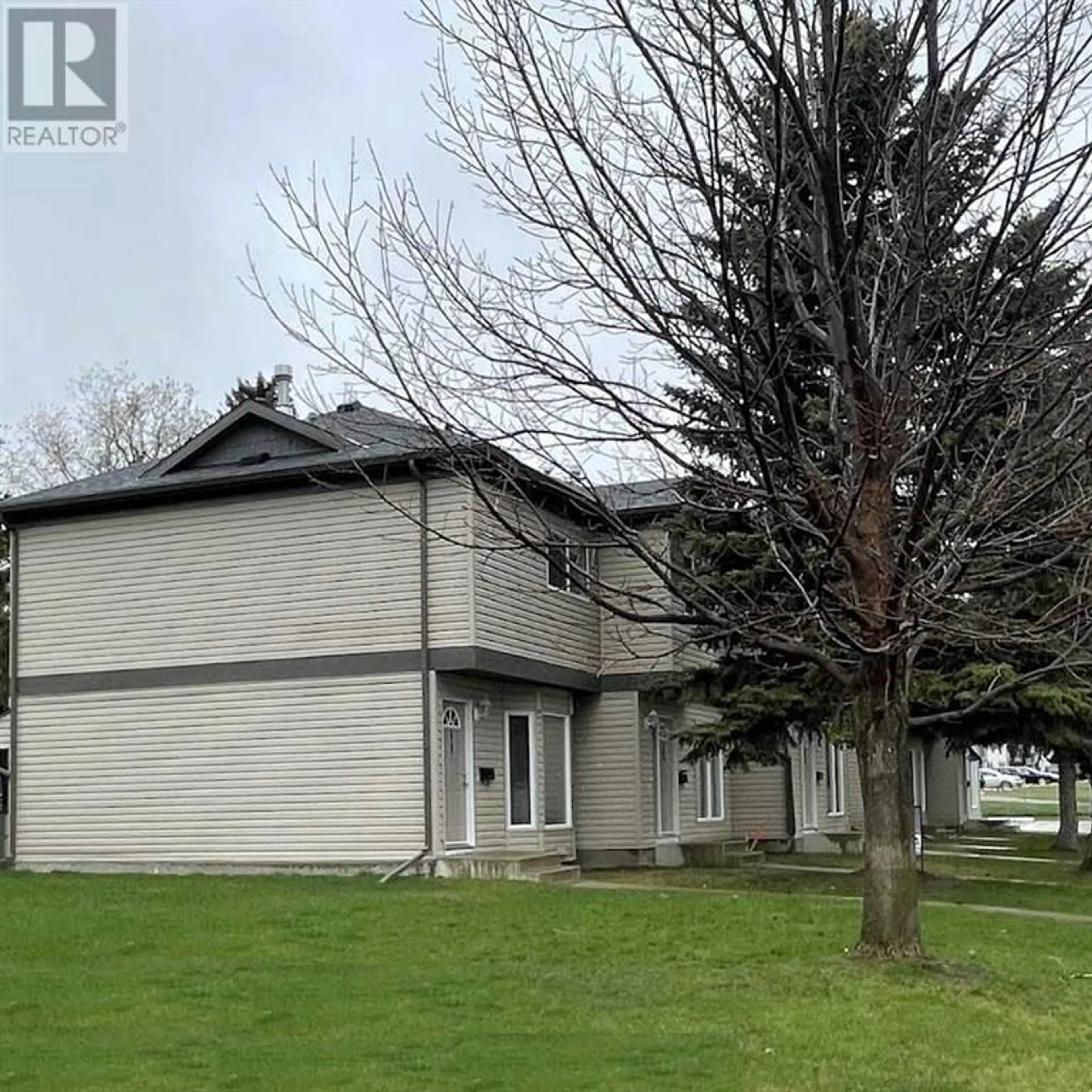 Frontside or backside of a home for 11 275 Columbia Boulevard W, Lethbridge Alberta T1K4B8