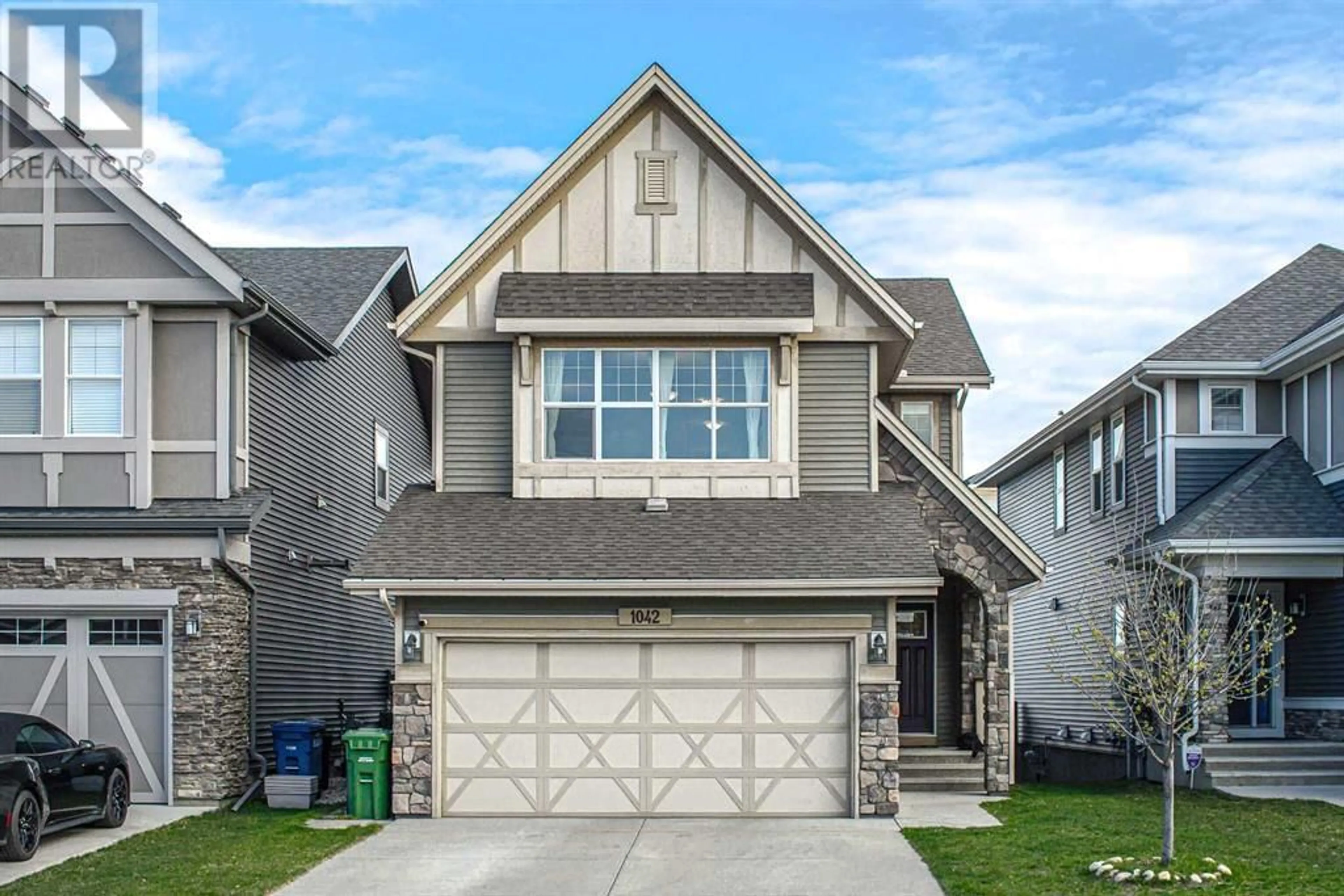 Frontside or backside of a home for 1042 Kings Heights Way SE, Airdrie Alberta T4A0S2