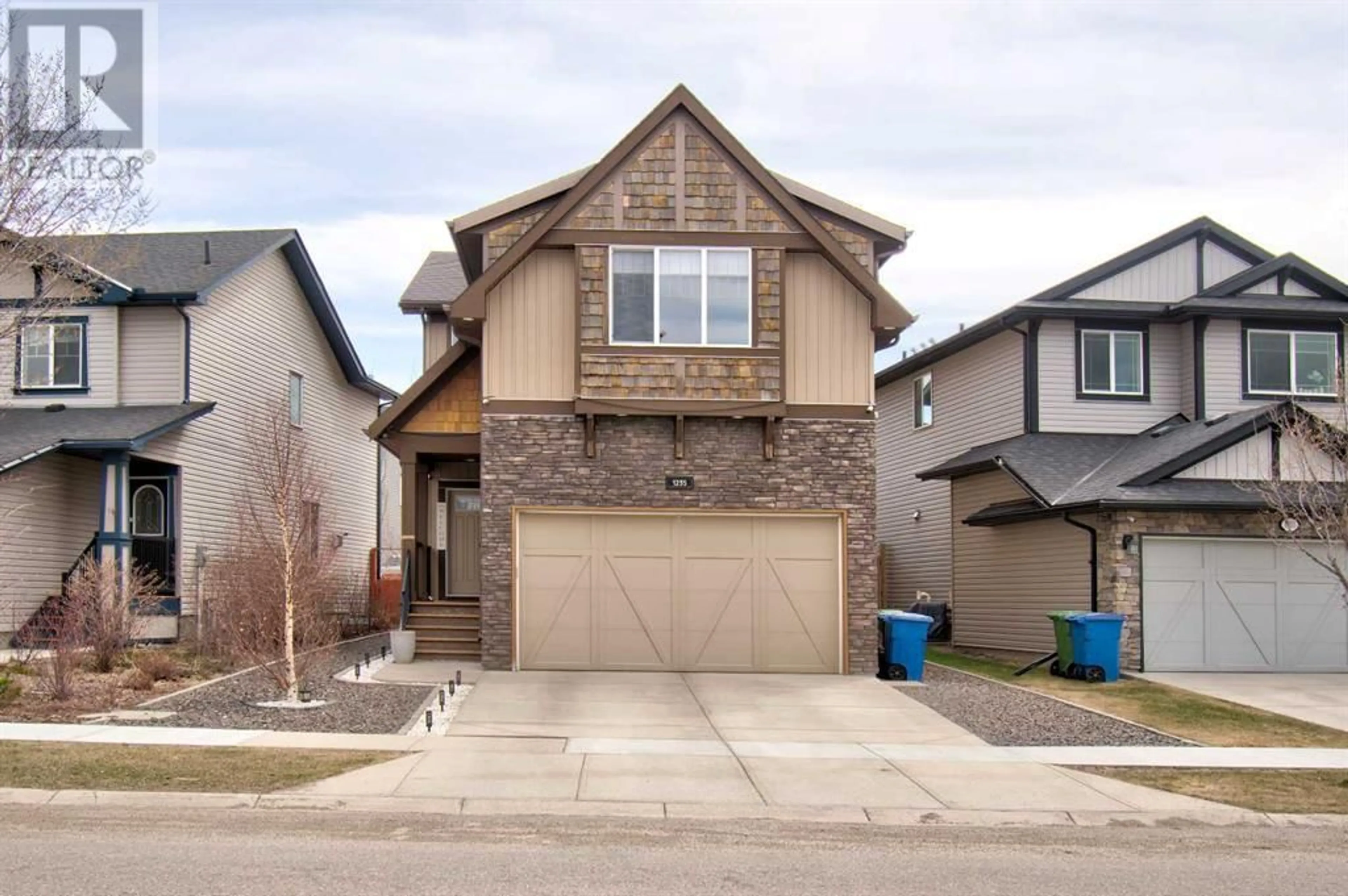 Frontside or backside of a home for 1235 King's Heights Road SE, Airdrie Alberta T4A0L6