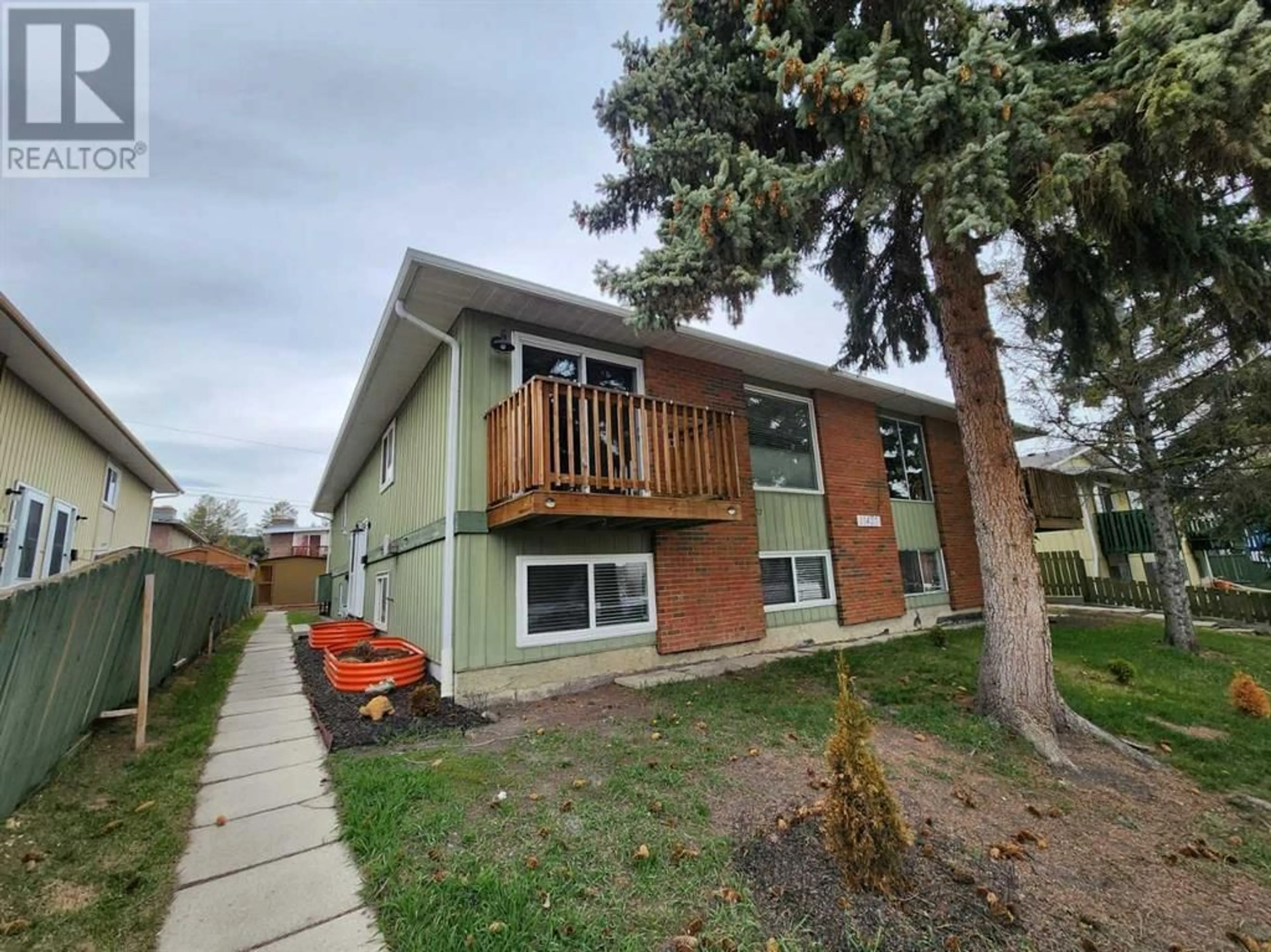 A pic from exterior of the house or condo for 11427B 8 Street SW, Calgary Alberta T2W2N4