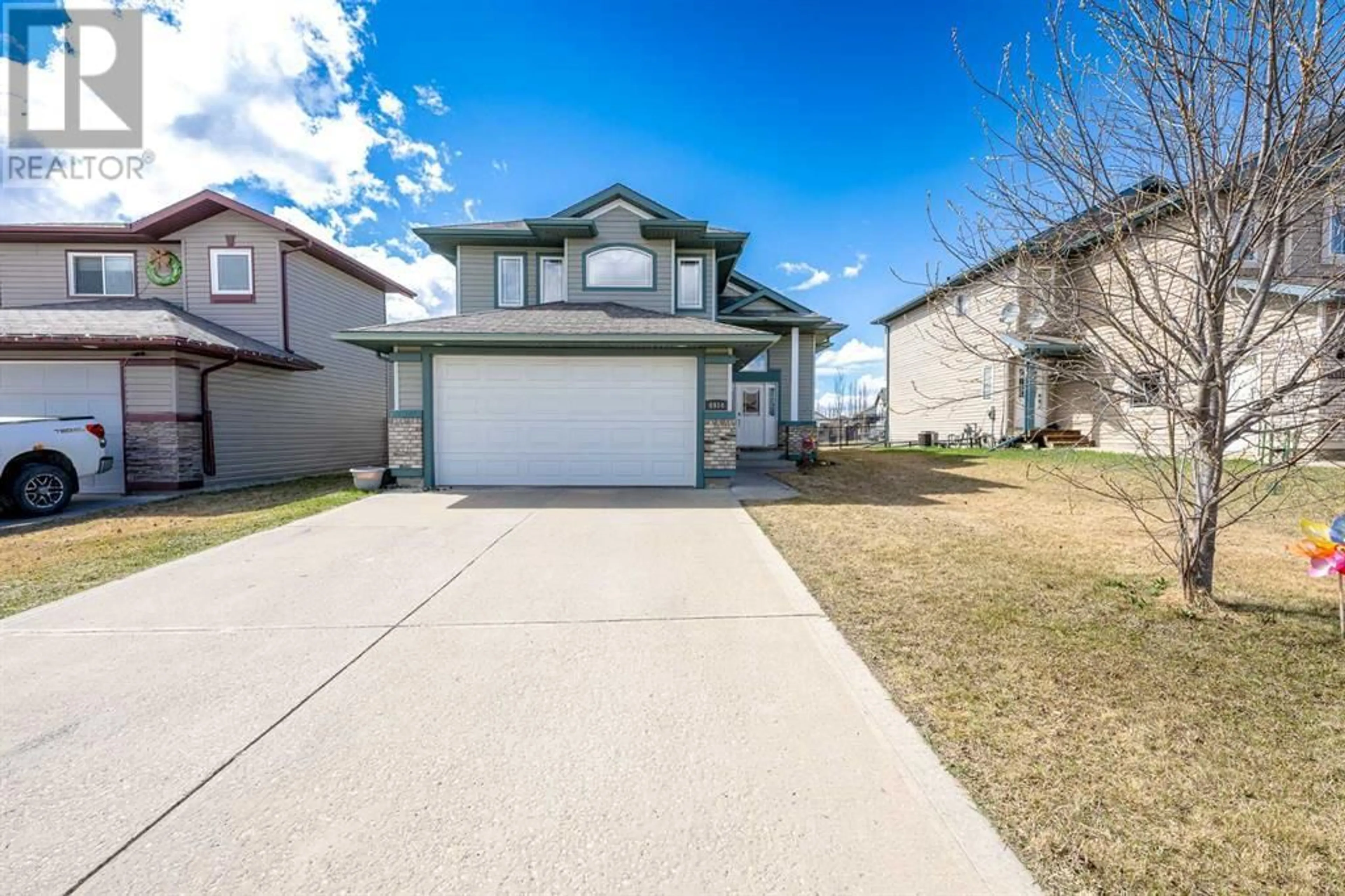 Frontside or backside of a home for 6914 114A Street, Grande Prairie Alberta T8W0E5