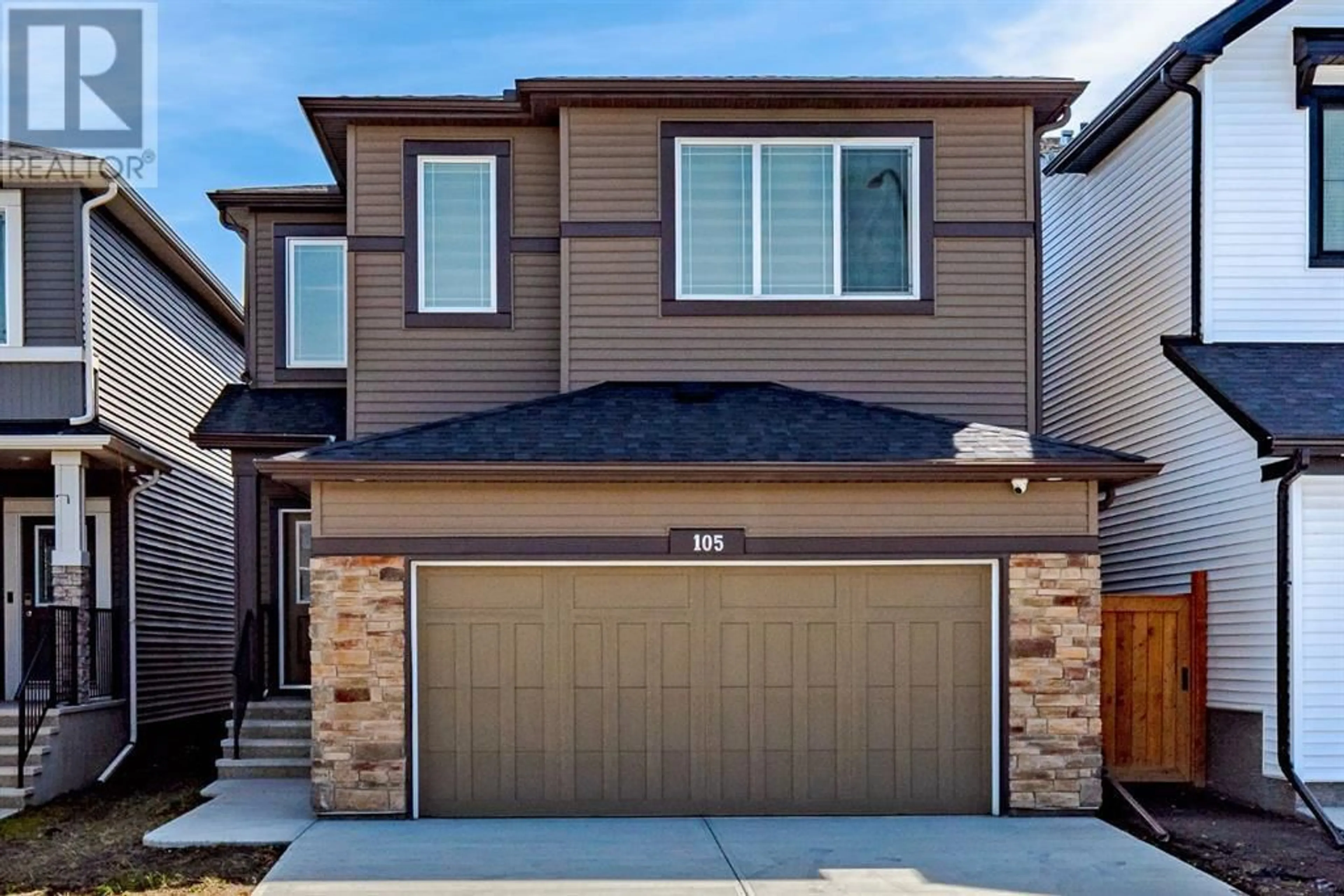 A pic from exterior of the house or condo for 105 Creekstone Path SW, Calgary Alberta T2X4P7