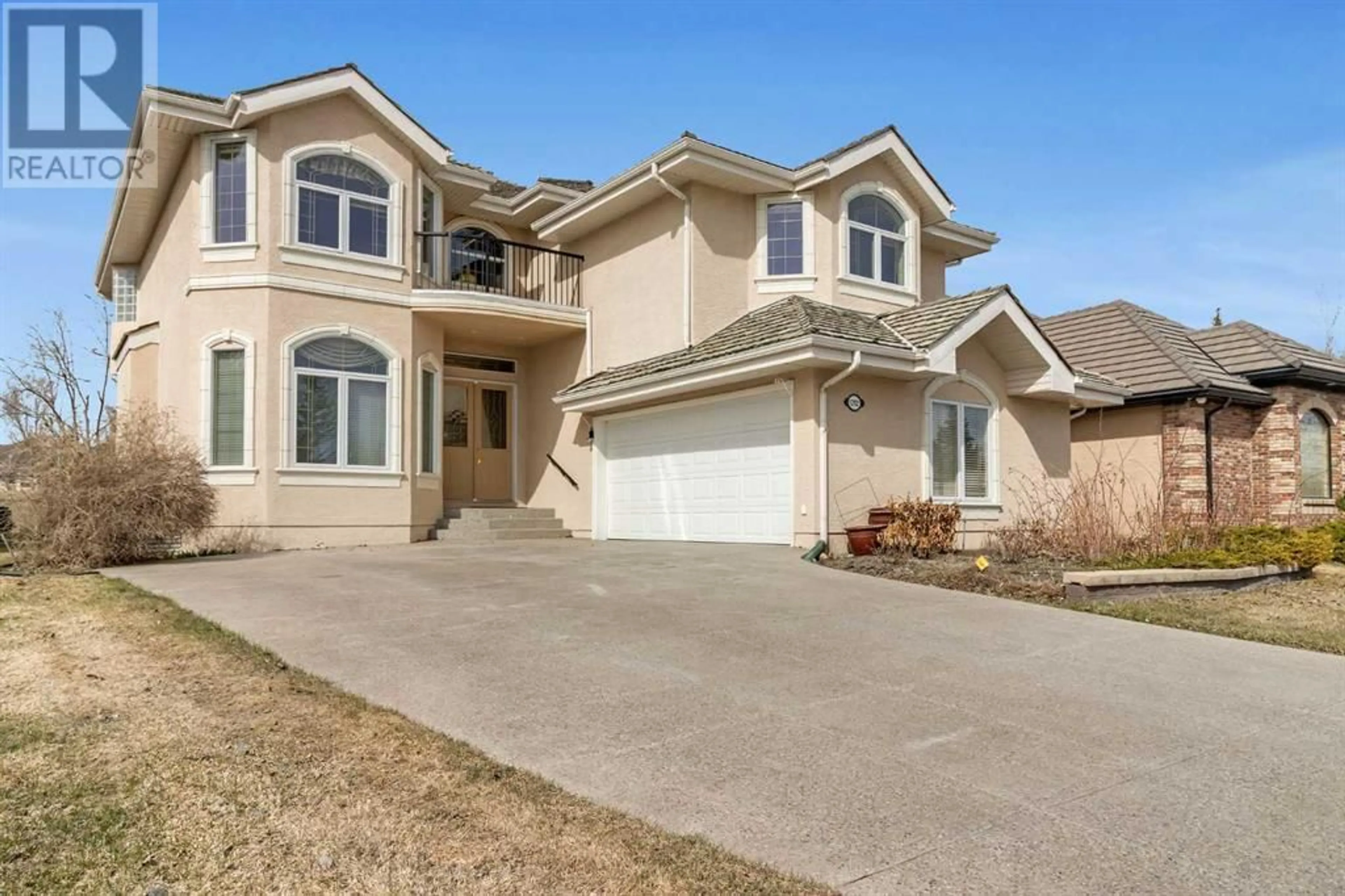 Frontside or backside of a home for 1712 Evergreen Drive SW, Calgary Alberta T2Y3R2