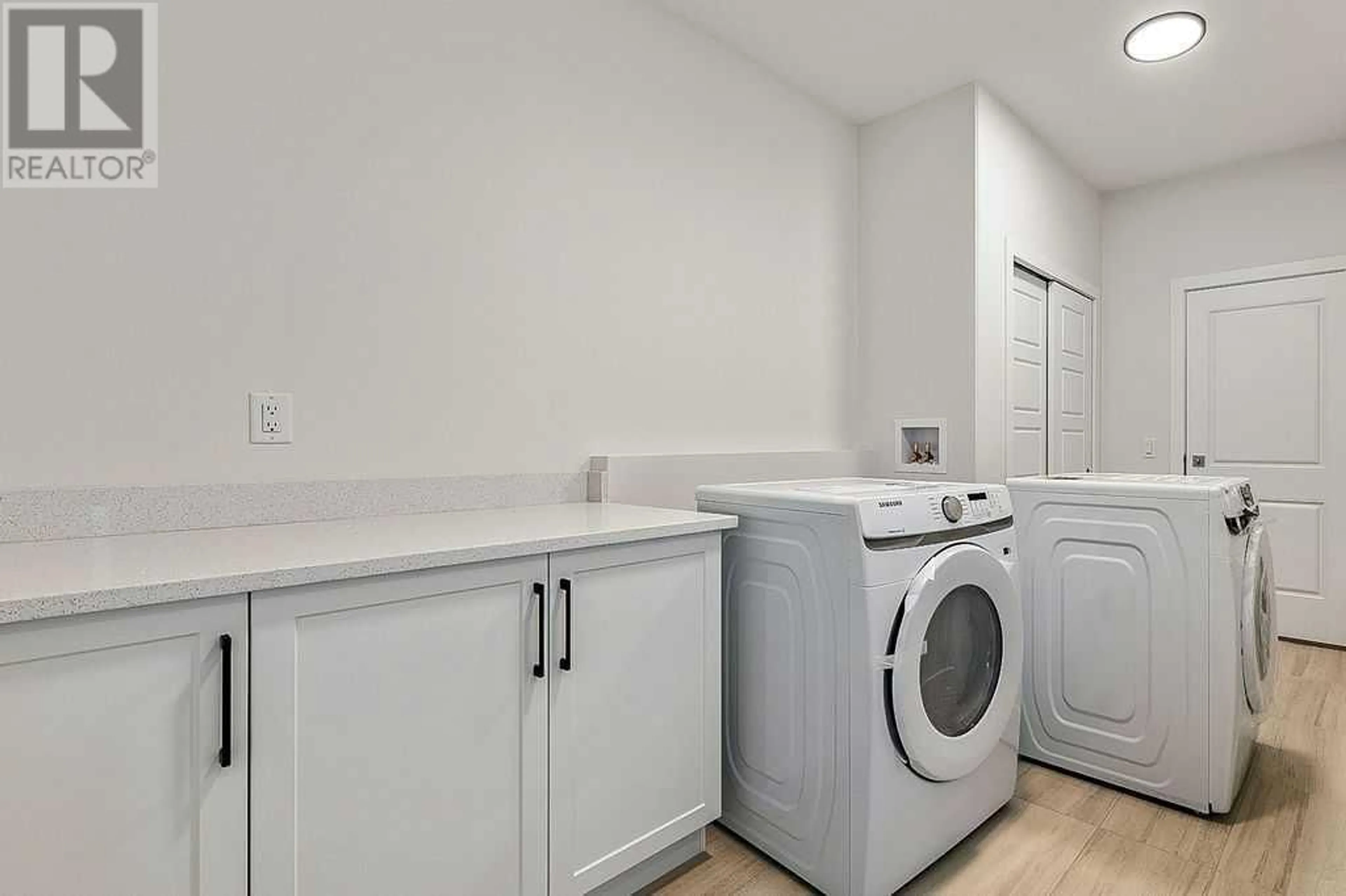 Laundry room for 17 Drake Landing Square, Okotoks Alberta T1S0R9