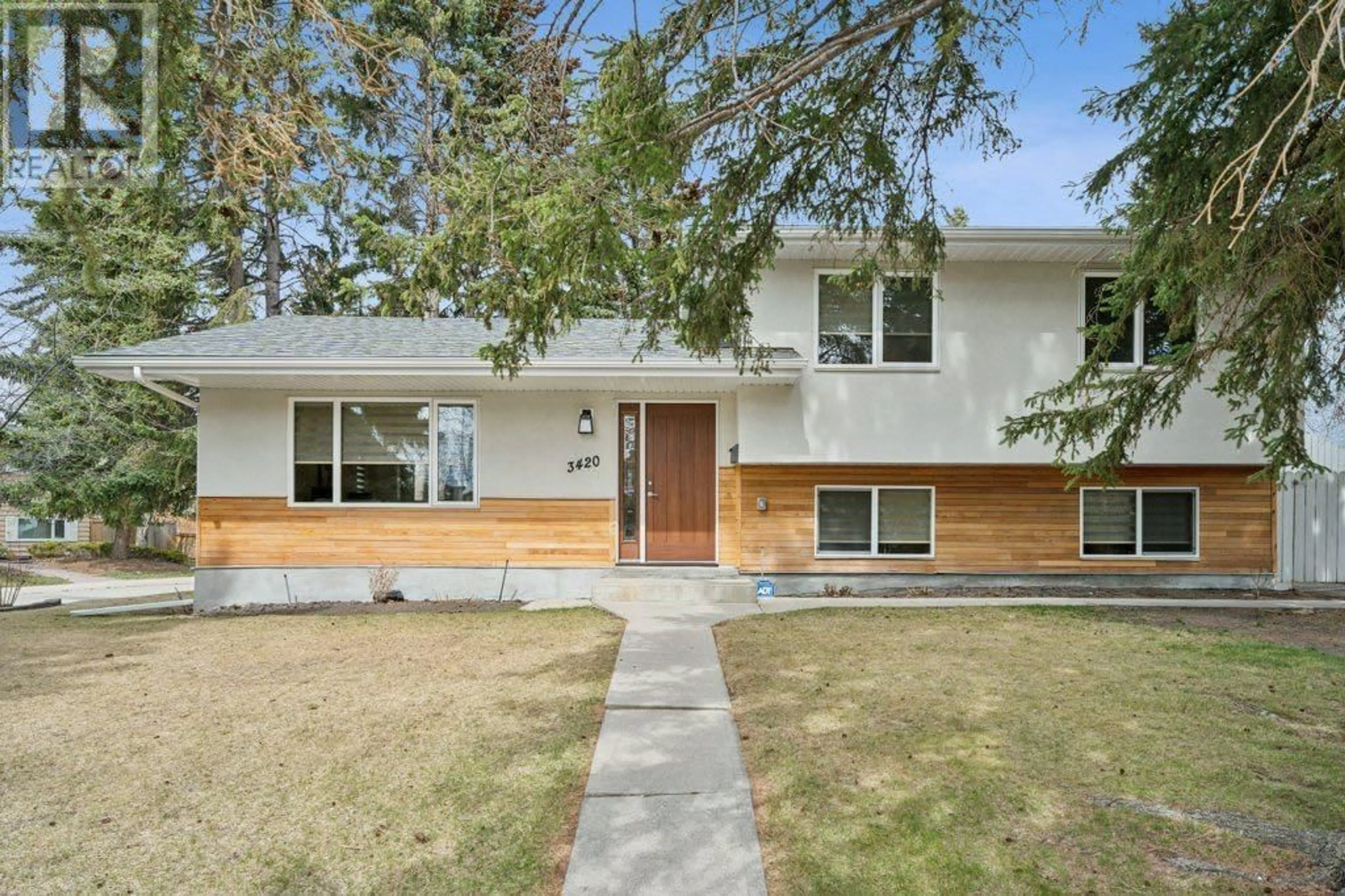 Home with vinyl exterior material for 3420 Utah Drive NW, Calgary Alberta T2N4A4