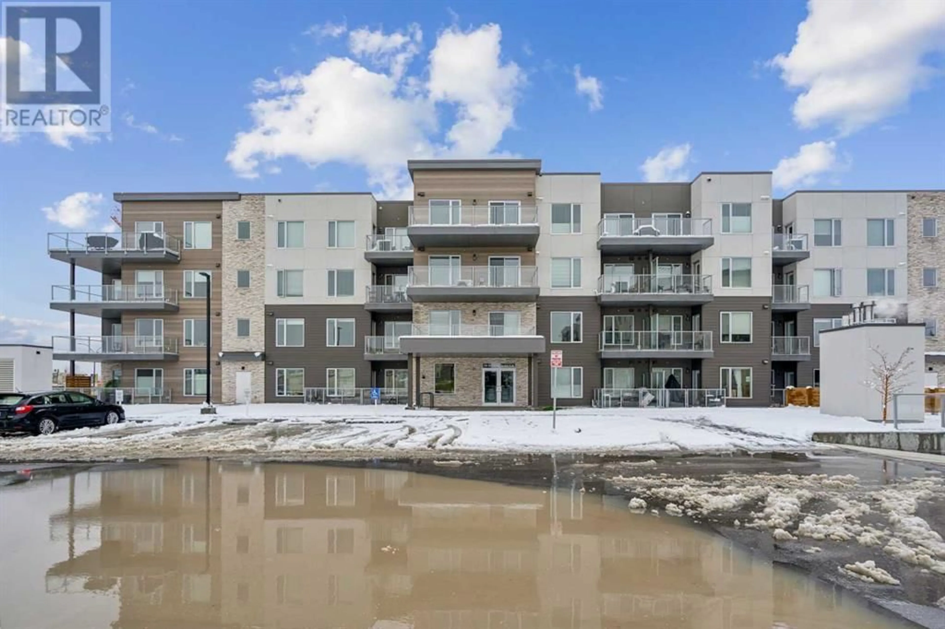 A pic from exterior of the house or condo for 212 150 Shawnee Square SW, Calgary Alberta T2Y0T6