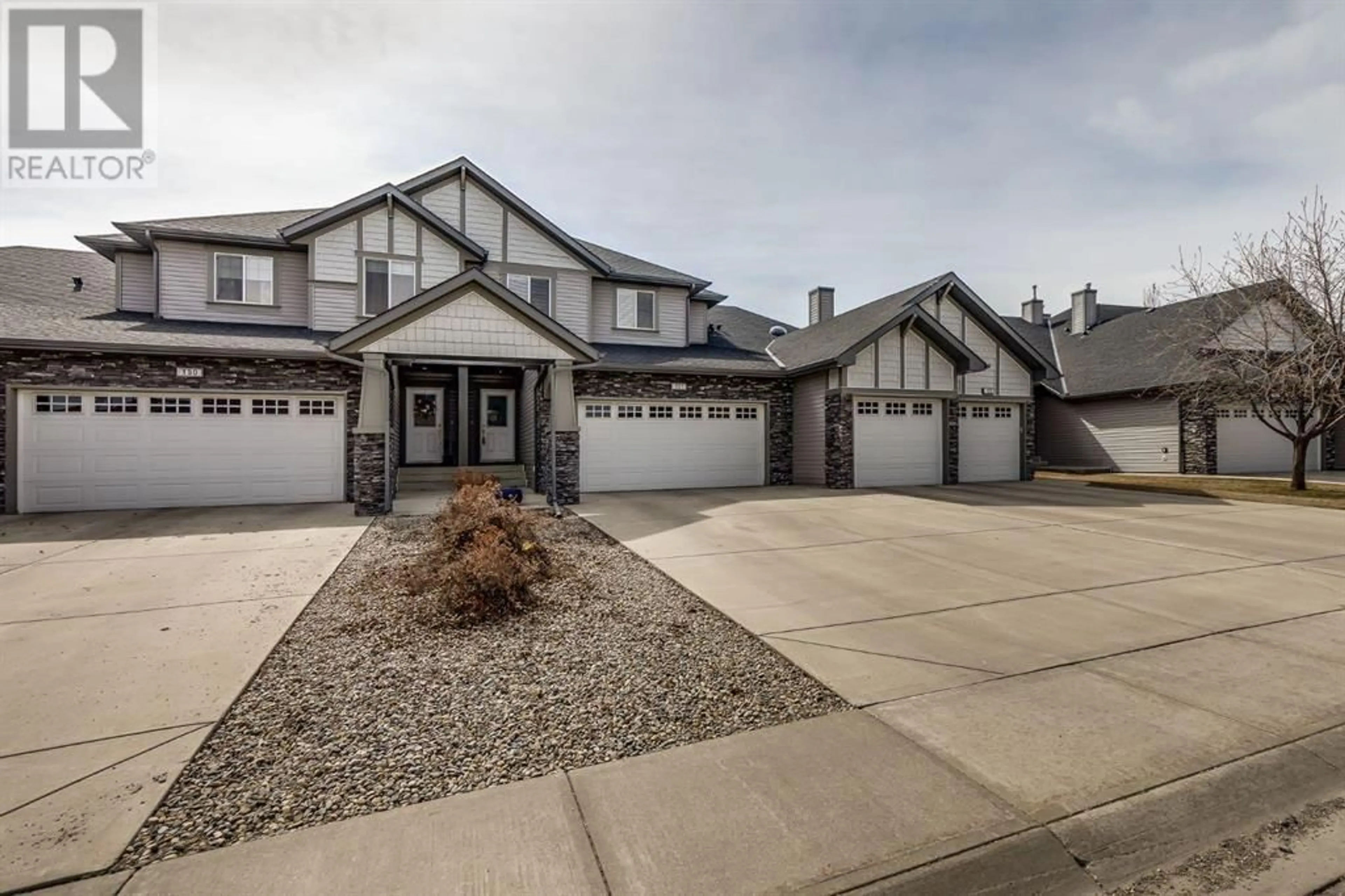 Frontside or backside of a home for 151 100 Coopers Common SW, Airdrie Alberta T4B3C7