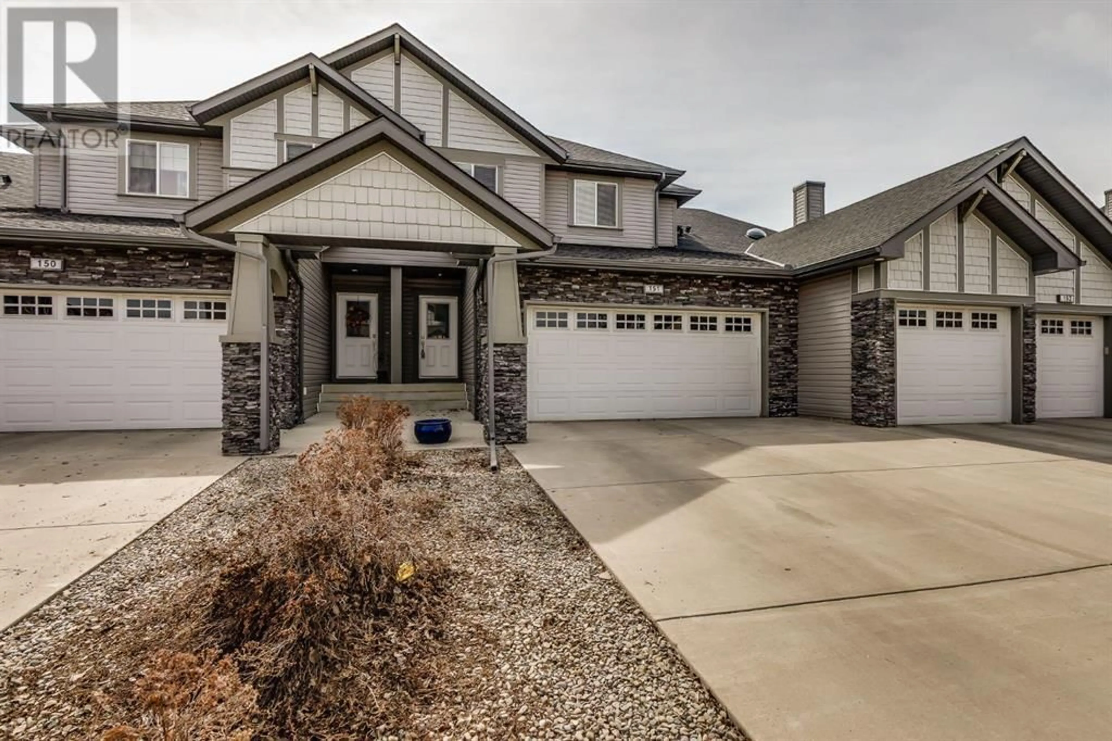 Frontside or backside of a home for 151 100 Coopers Common SW, Airdrie Alberta T4B3C7