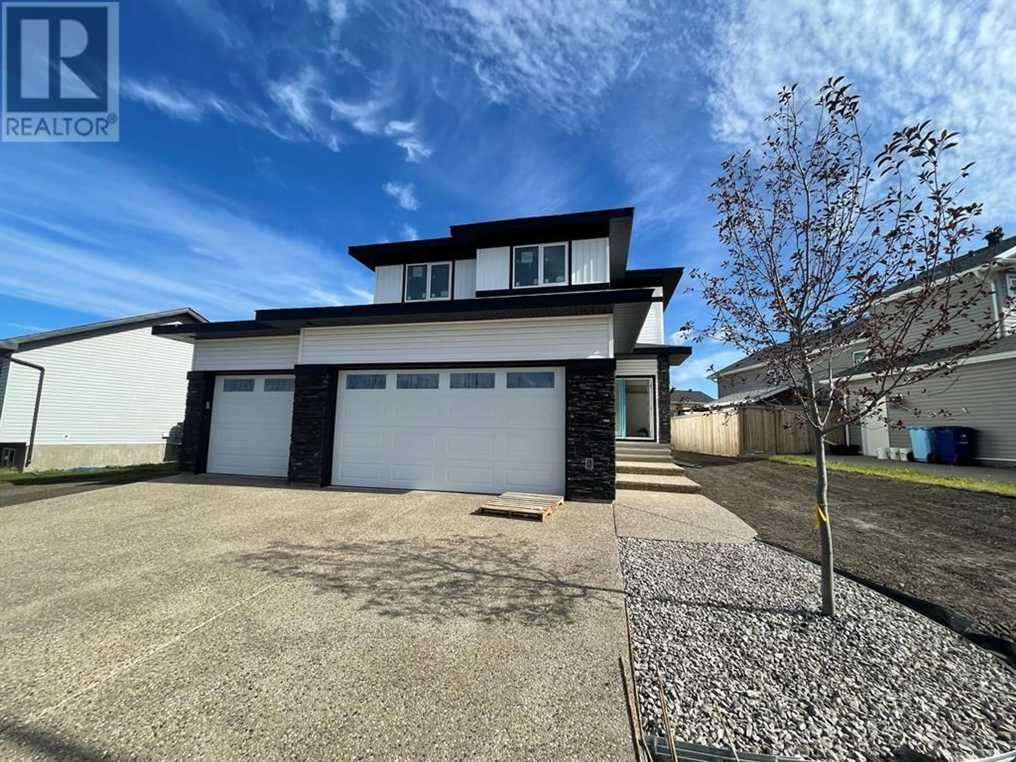 Frontside or backside of a home for 304 Beacon Hill Drive, Fort McMurray Alberta T9H2R6