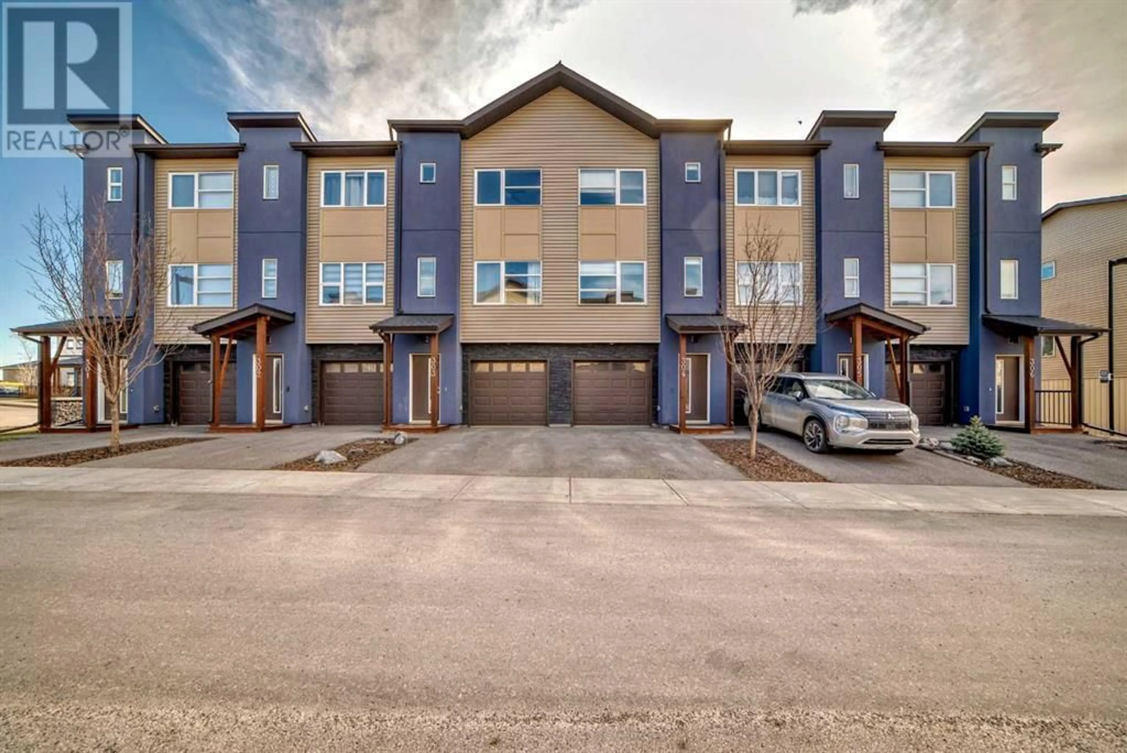 A pic from exterior of the house or condo for 304 2461 Baysprings Link SW, Airdrie Alberta T4B4C6