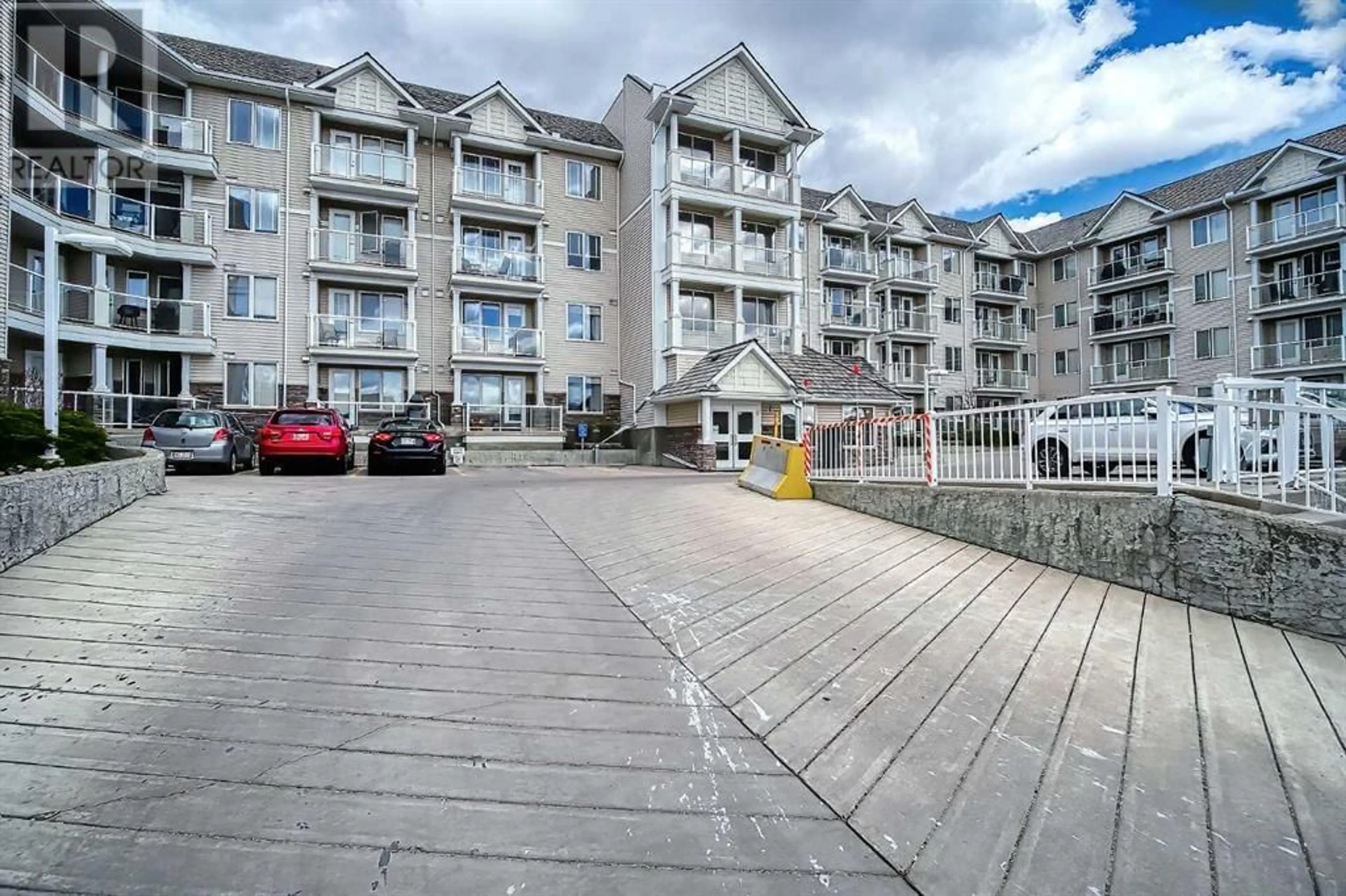 A pic from exterior of the house or condo for 315 500 Rocky Vista Gardens NW, Calgary Alberta T3G0C3