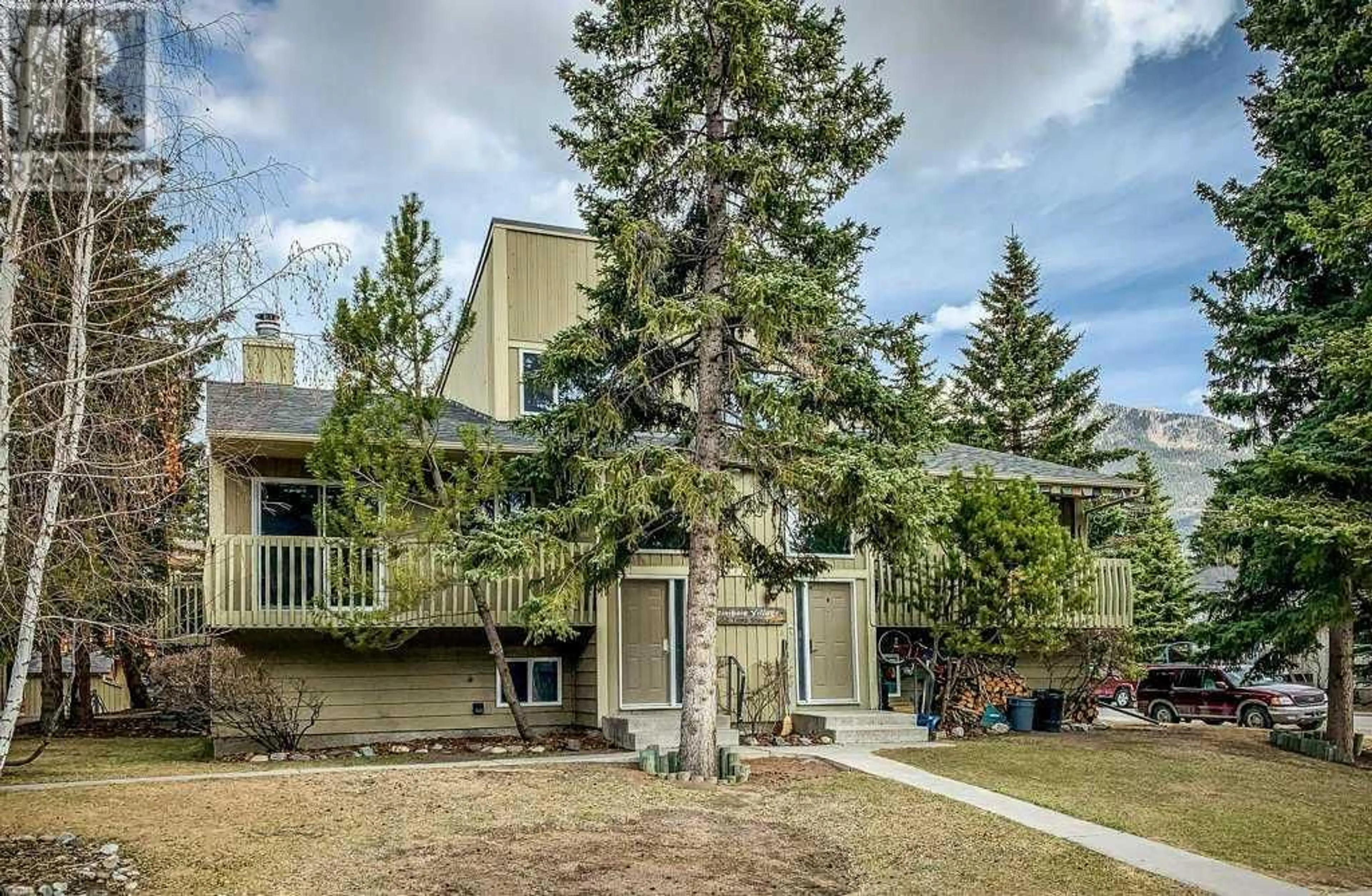 A pic from exterior of the house or condo for 6 602 3rd Street, Canmore Alberta T1W2J5