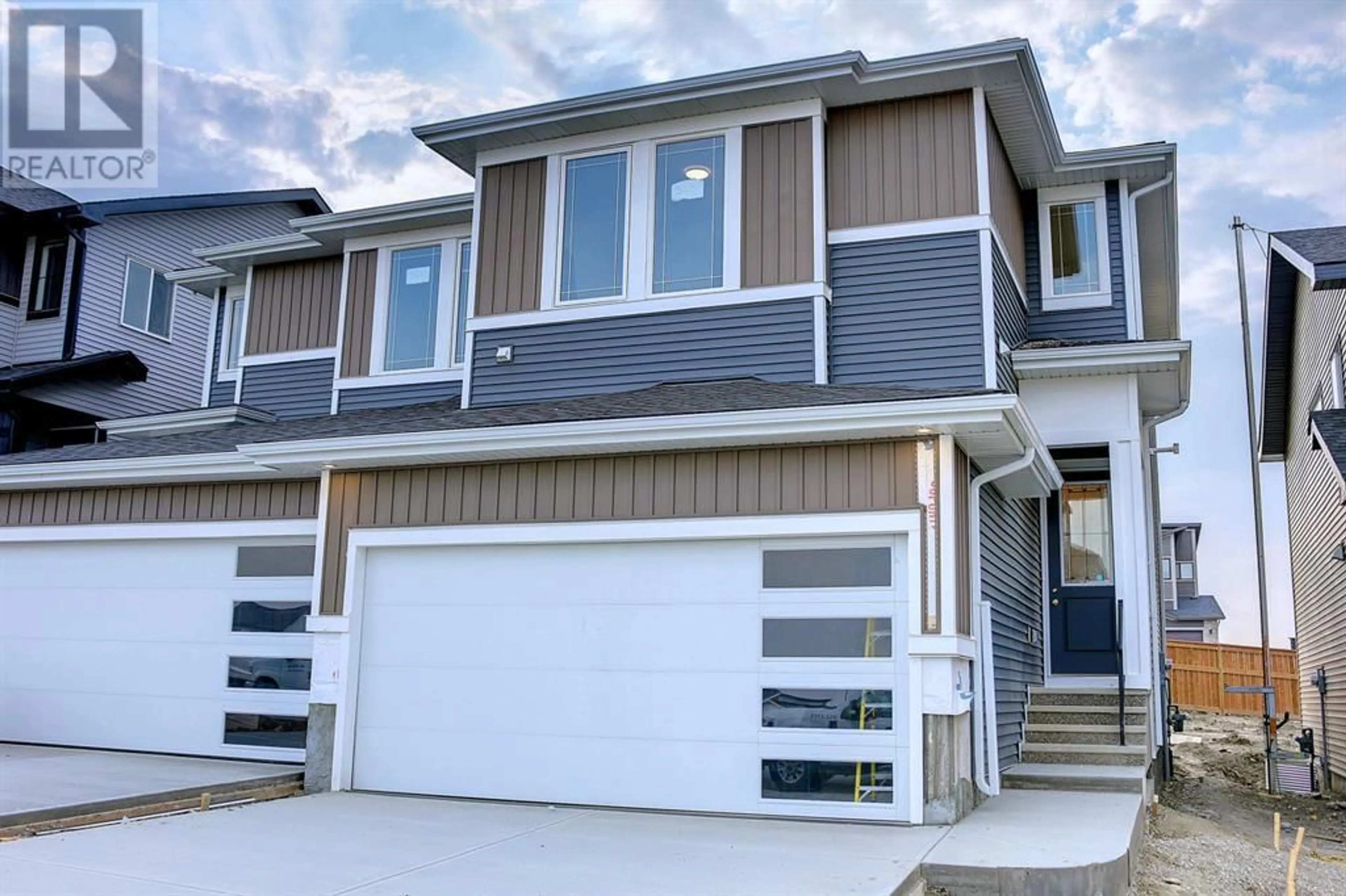 A pic from exterior of the house or condo for 48 Mill Road, Cochrane Alberta T4C3G7