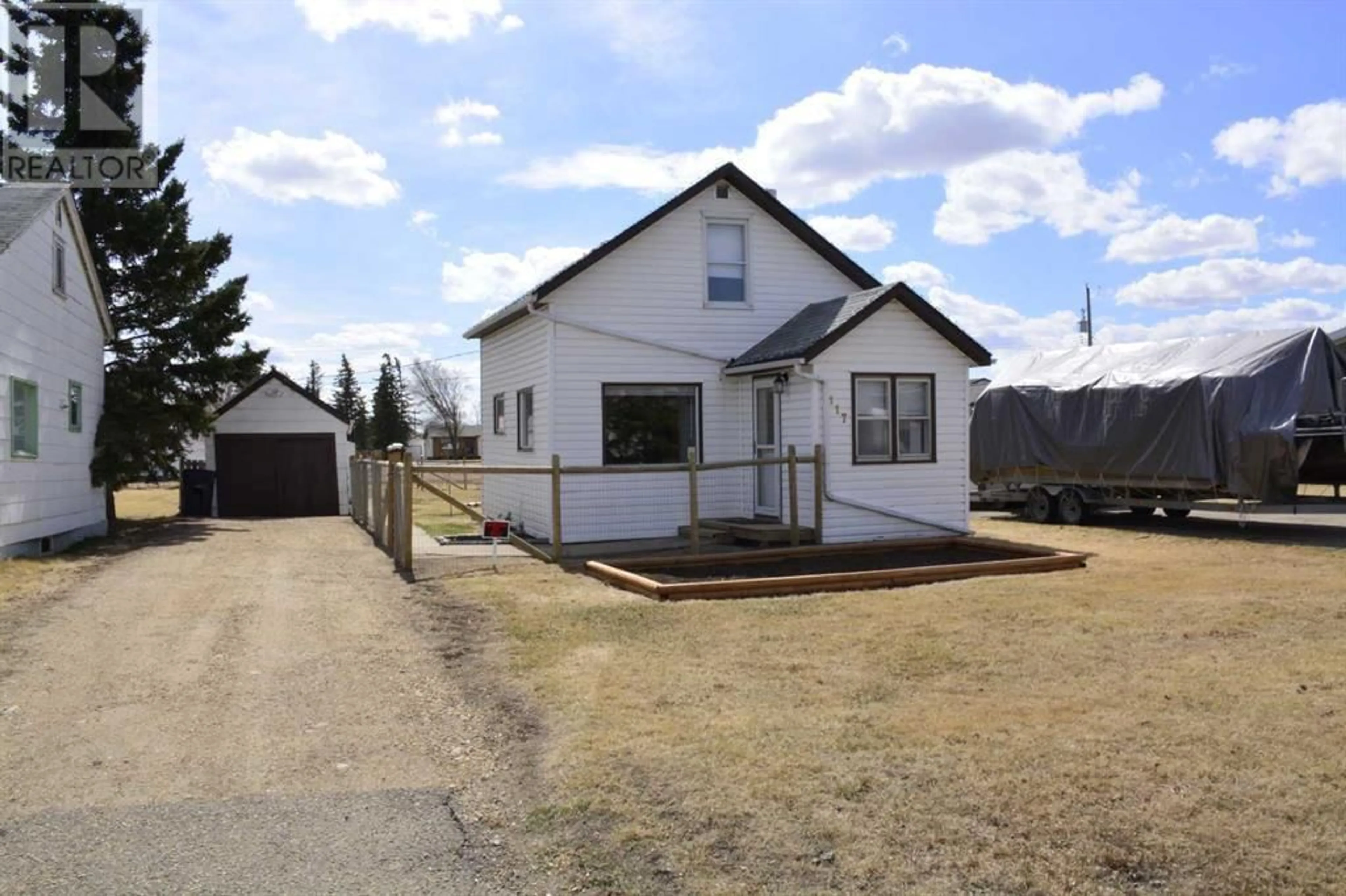 Frontside or backside of a home for 117 1st Avenue, Falher Alberta T0H1M0