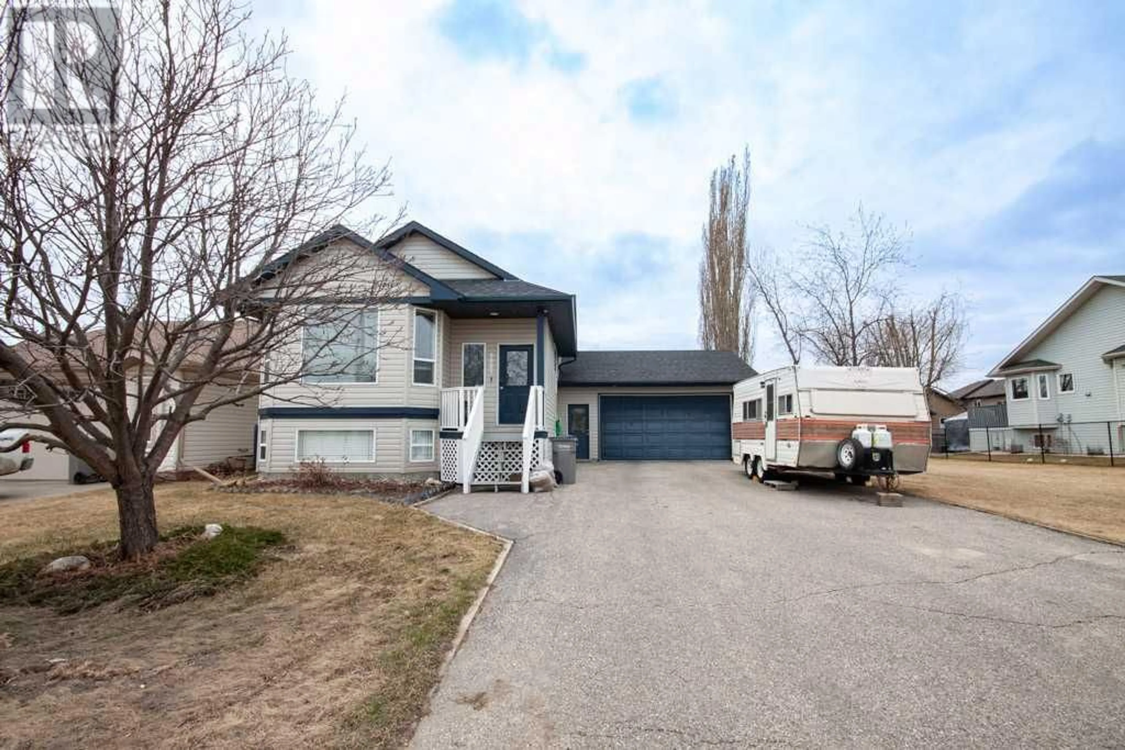 Frontside or backside of a home for 9005 60A Avenue, Grande Prairie Alberta T8W2N4