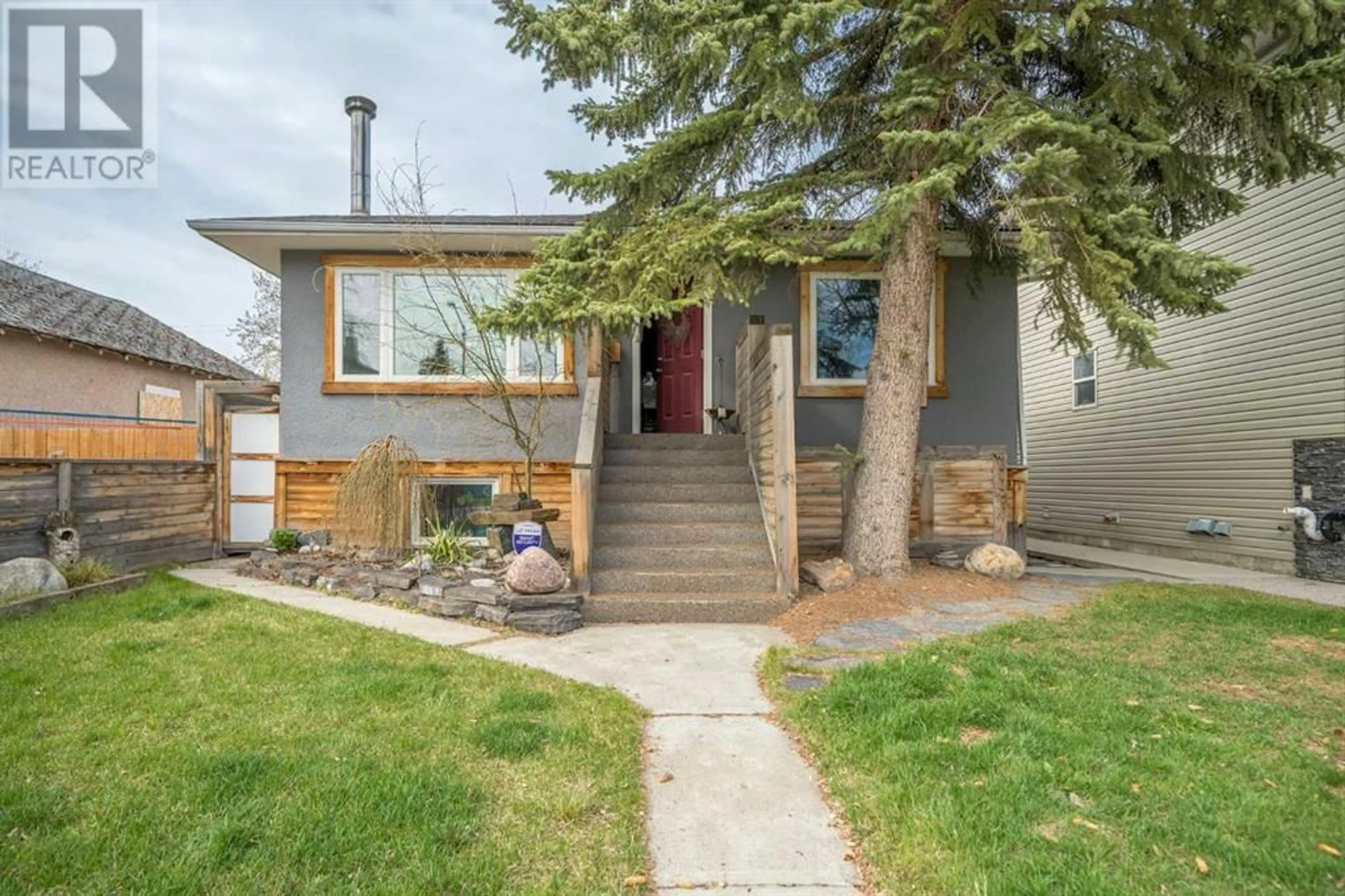 Frontside or backside of a home for 220 20 Avenue NE, Calgary Alberta T2E1P9
