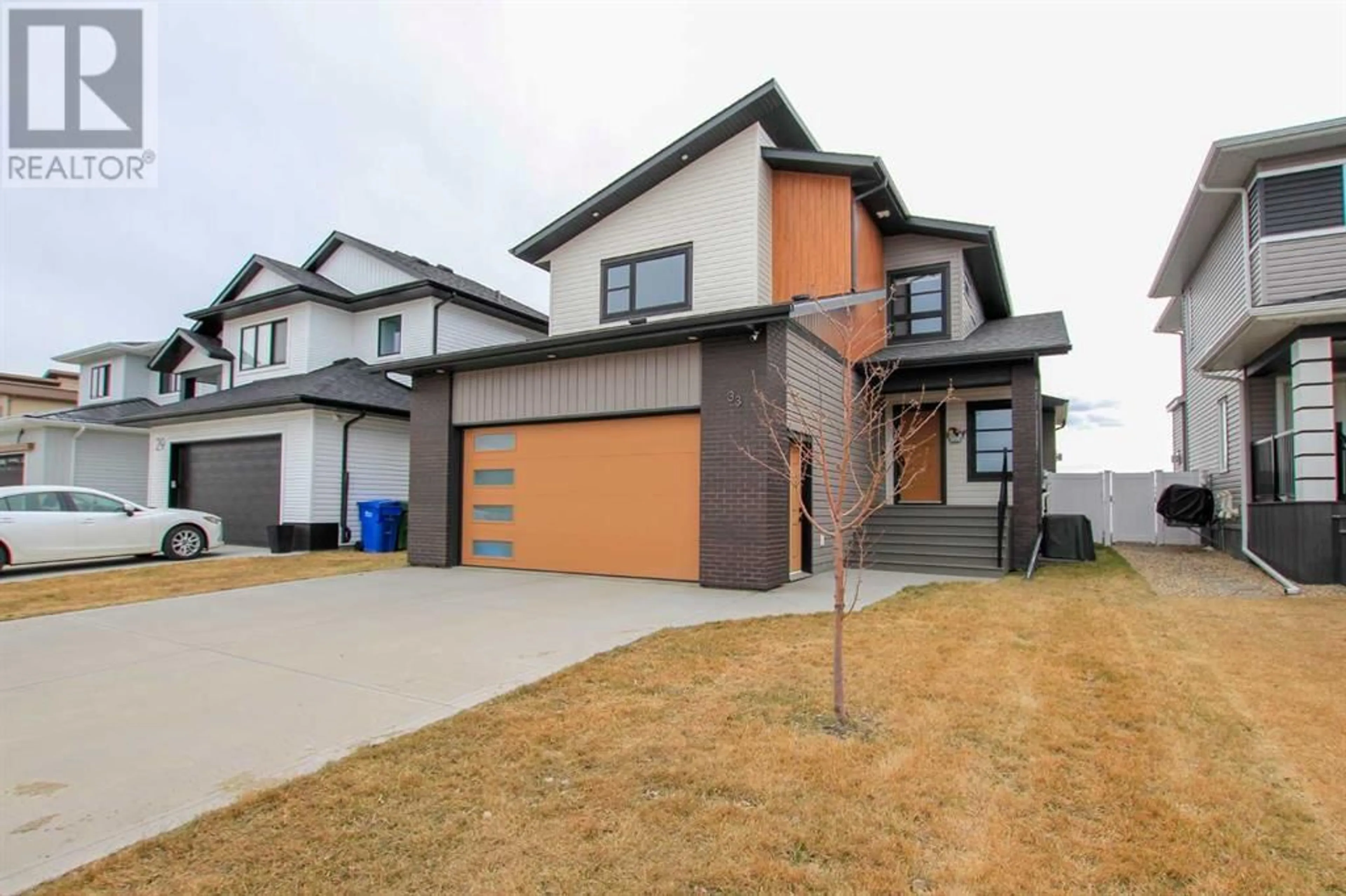Frontside or backside of a home for 33 Larratt Close, Red Deer Alberta T4R0S6
