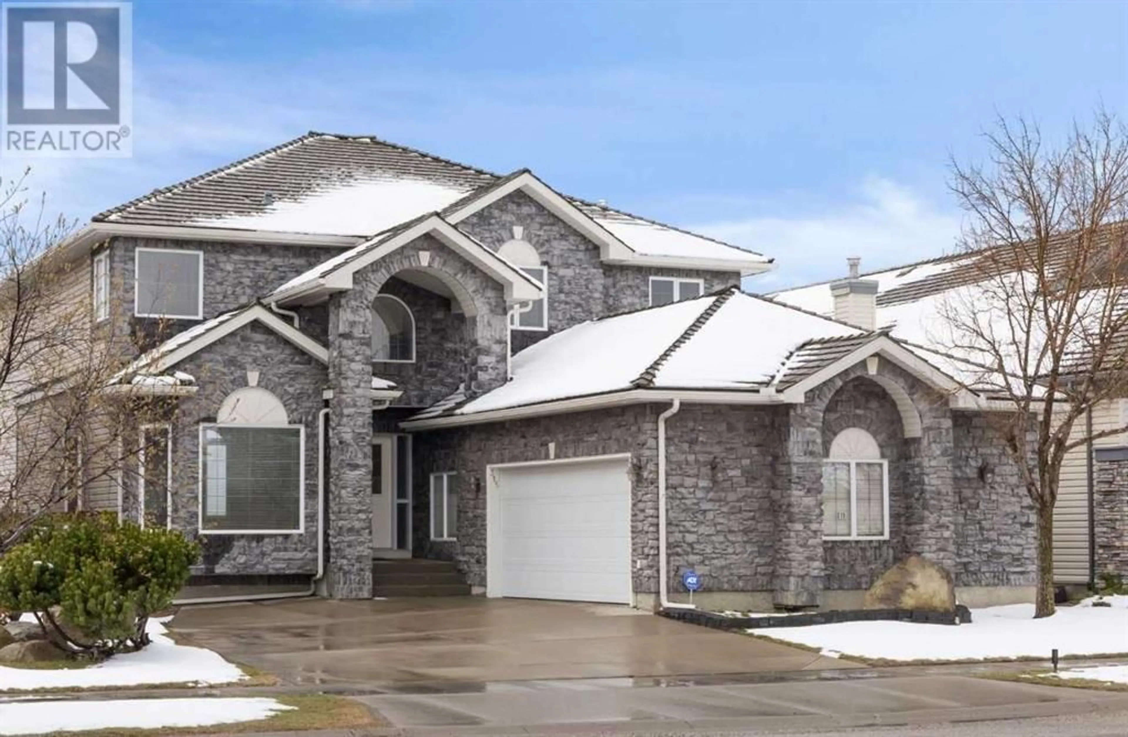 Frontside or backside of a home for 315 Rocky Ridge Drive NW, Calgary Alberta T3G4P4