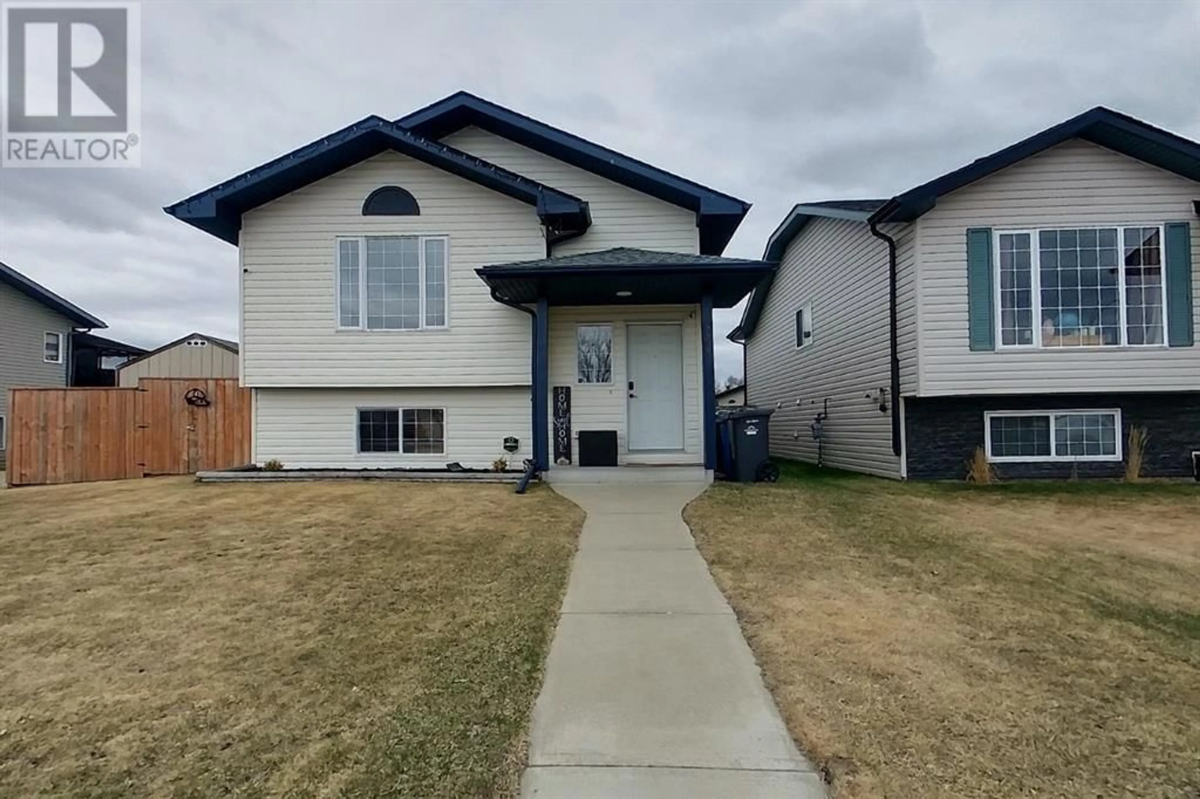 Frontside or backside of a home for 4458 54A AvenueCrescent, Innisfail Alberta T4G1Y3