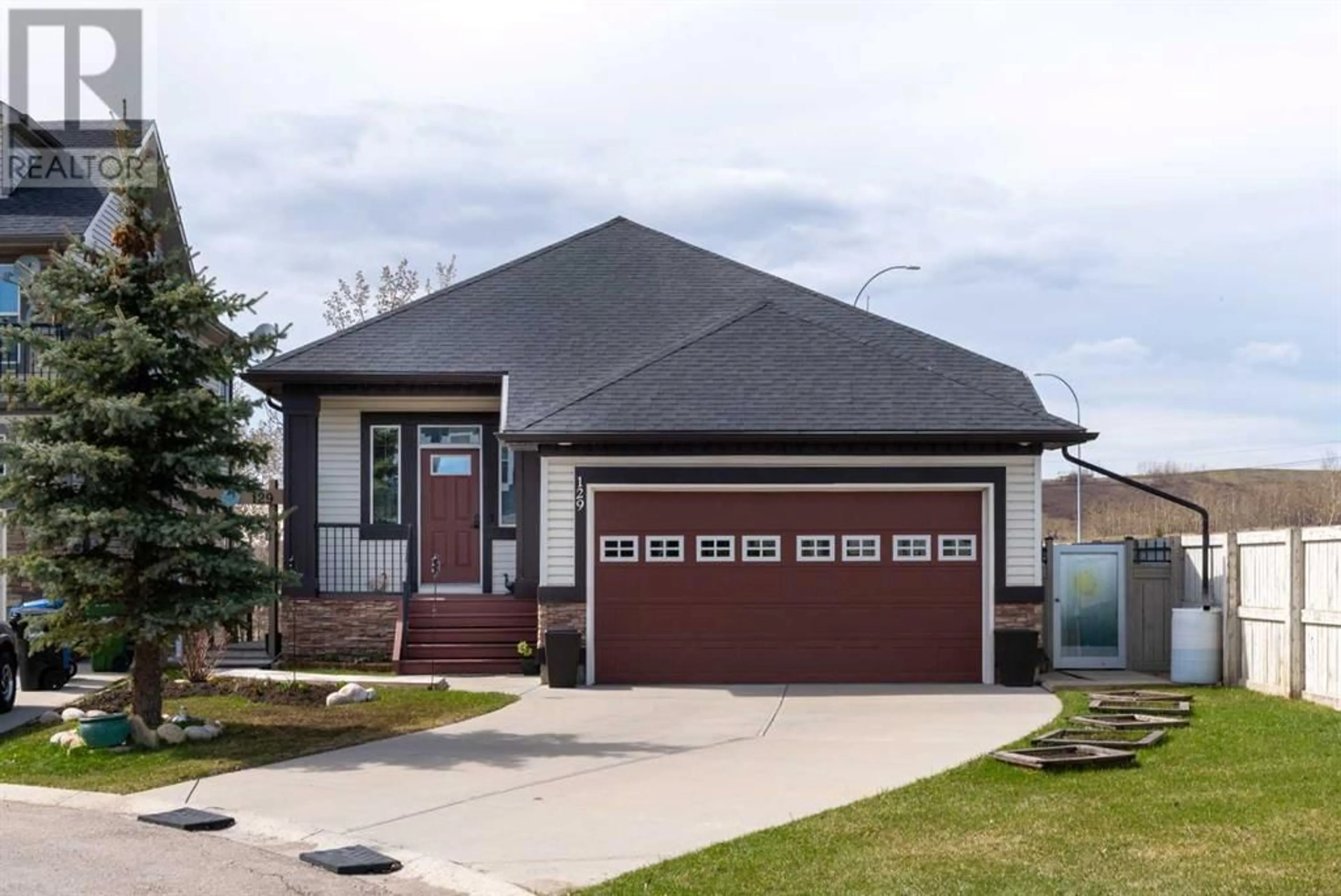 Frontside or backside of a home for 129 Royal Oak Heath NW, Calgary Alberta T3G0B5