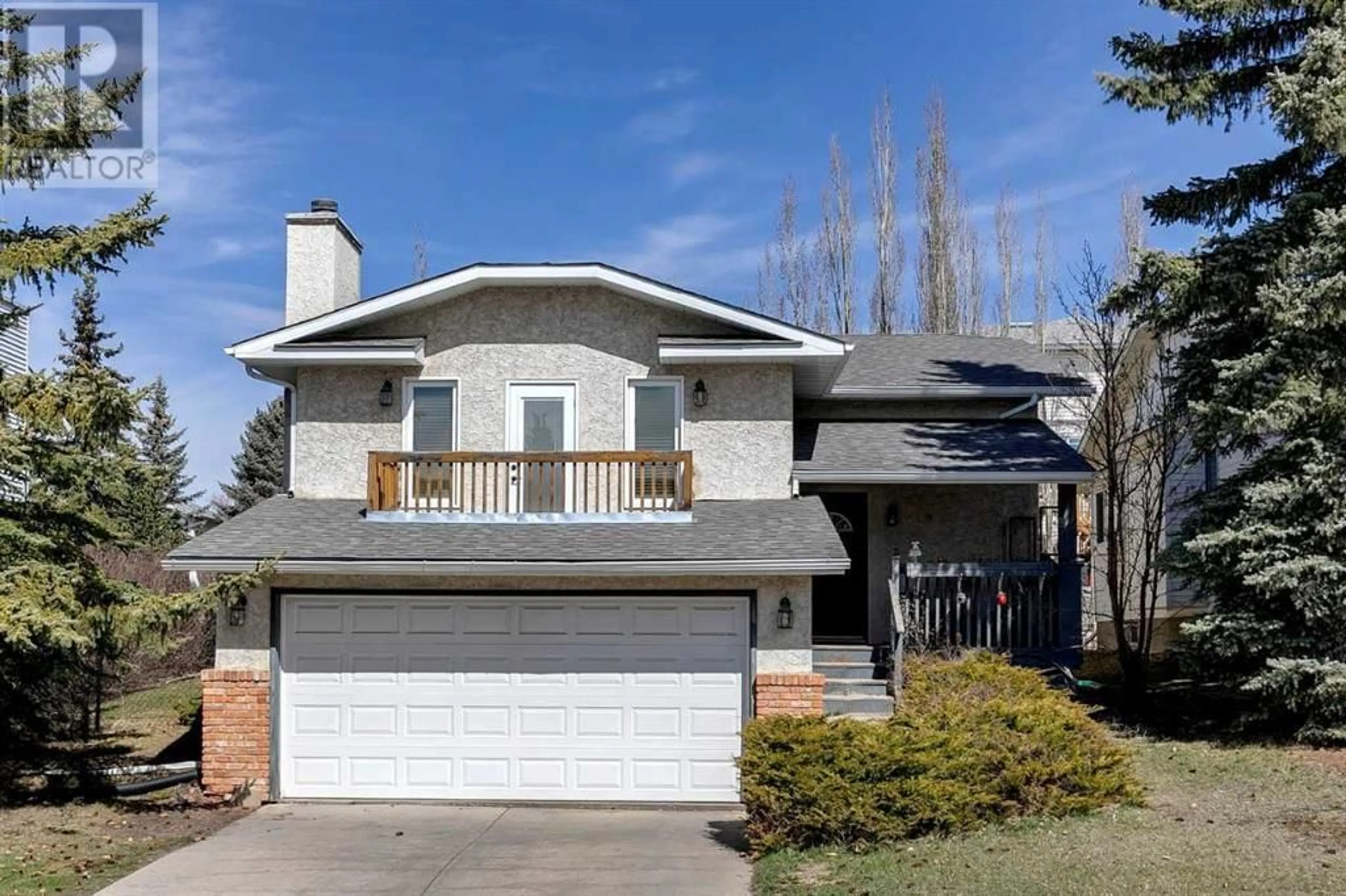 Frontside or backside of a home for 710 Hawkwood Boulevard NW, Calgary Alberta T3G2V5