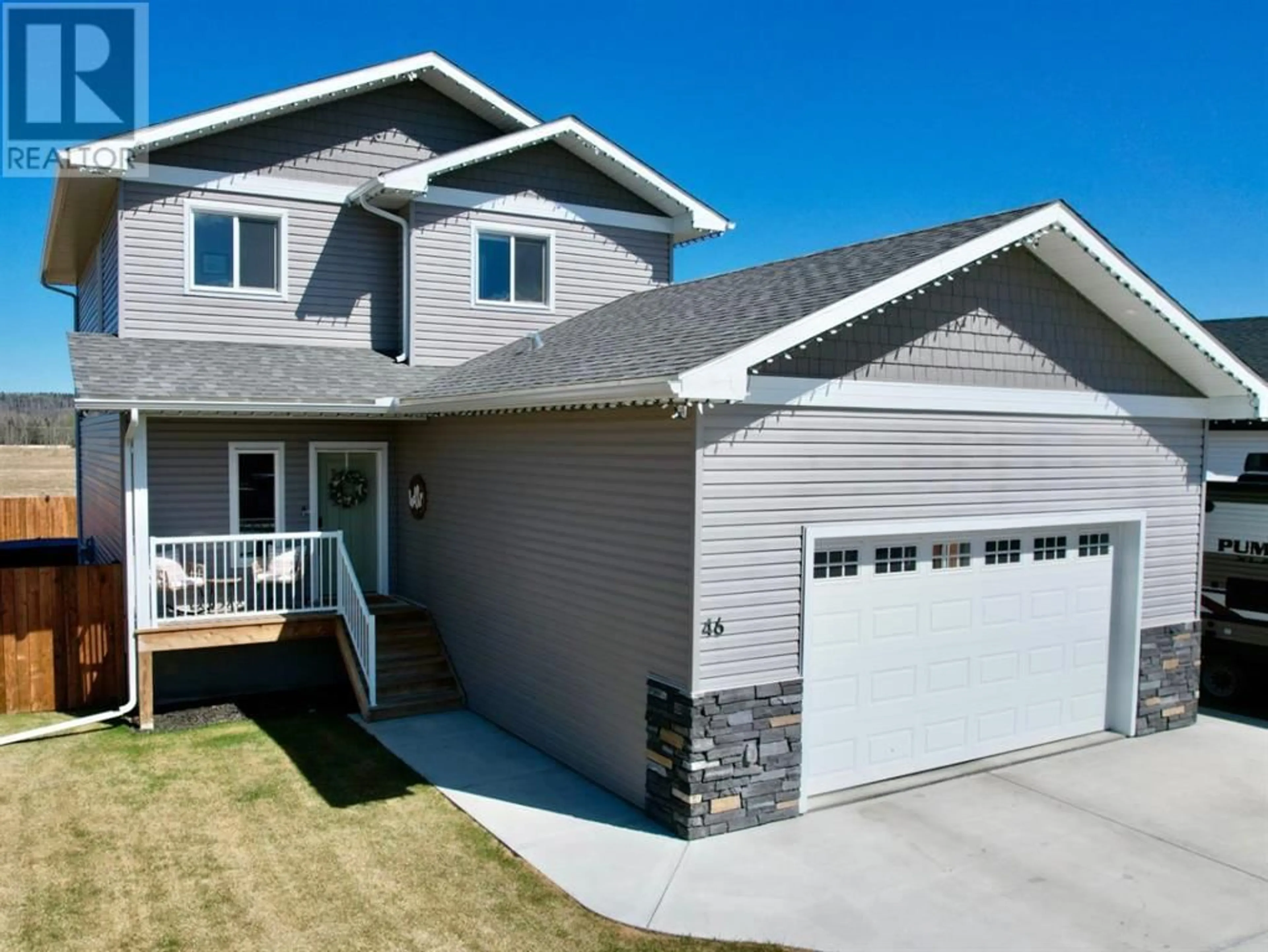 Home with vinyl exterior material for 46 Riverdale Bend, Whitecourt Alberta T7S0G4