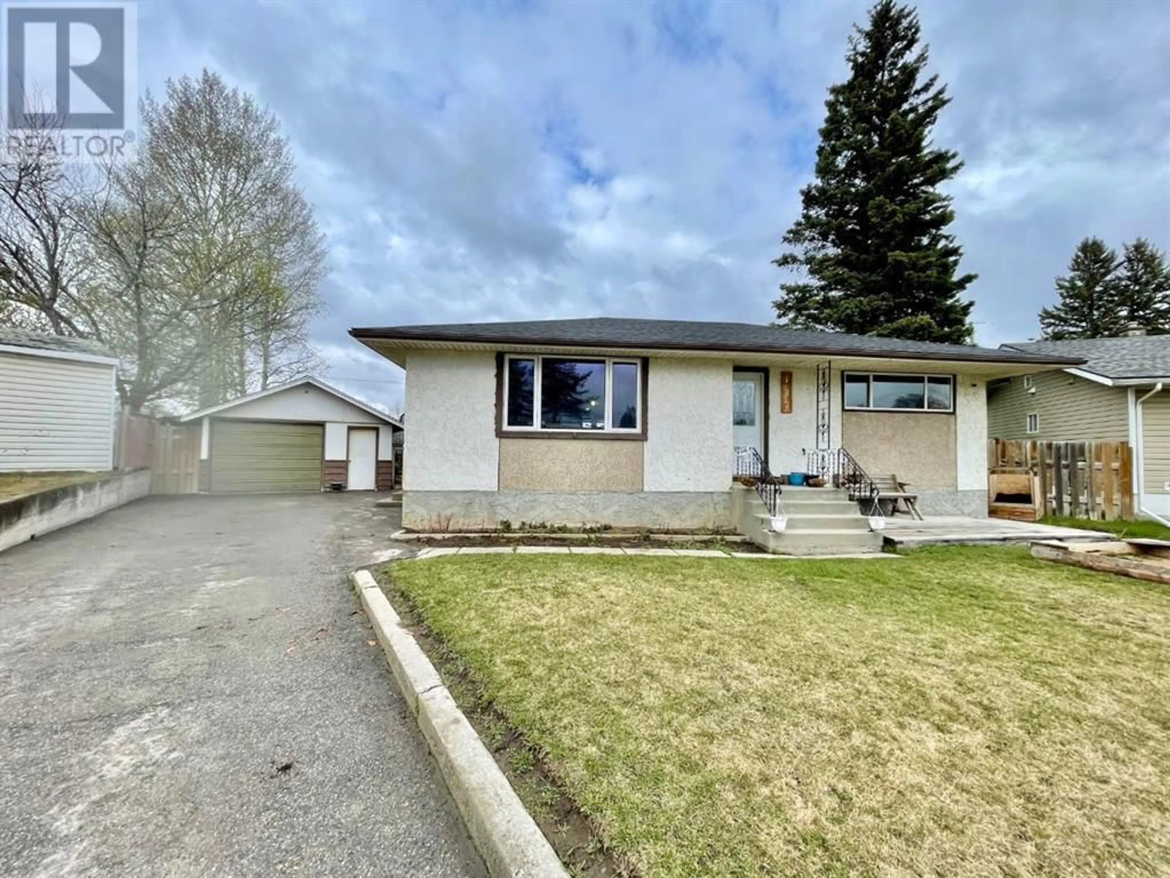 Frontside or backside of a home for 102 BLISS Avenue, Hinton Alberta T7V1B8