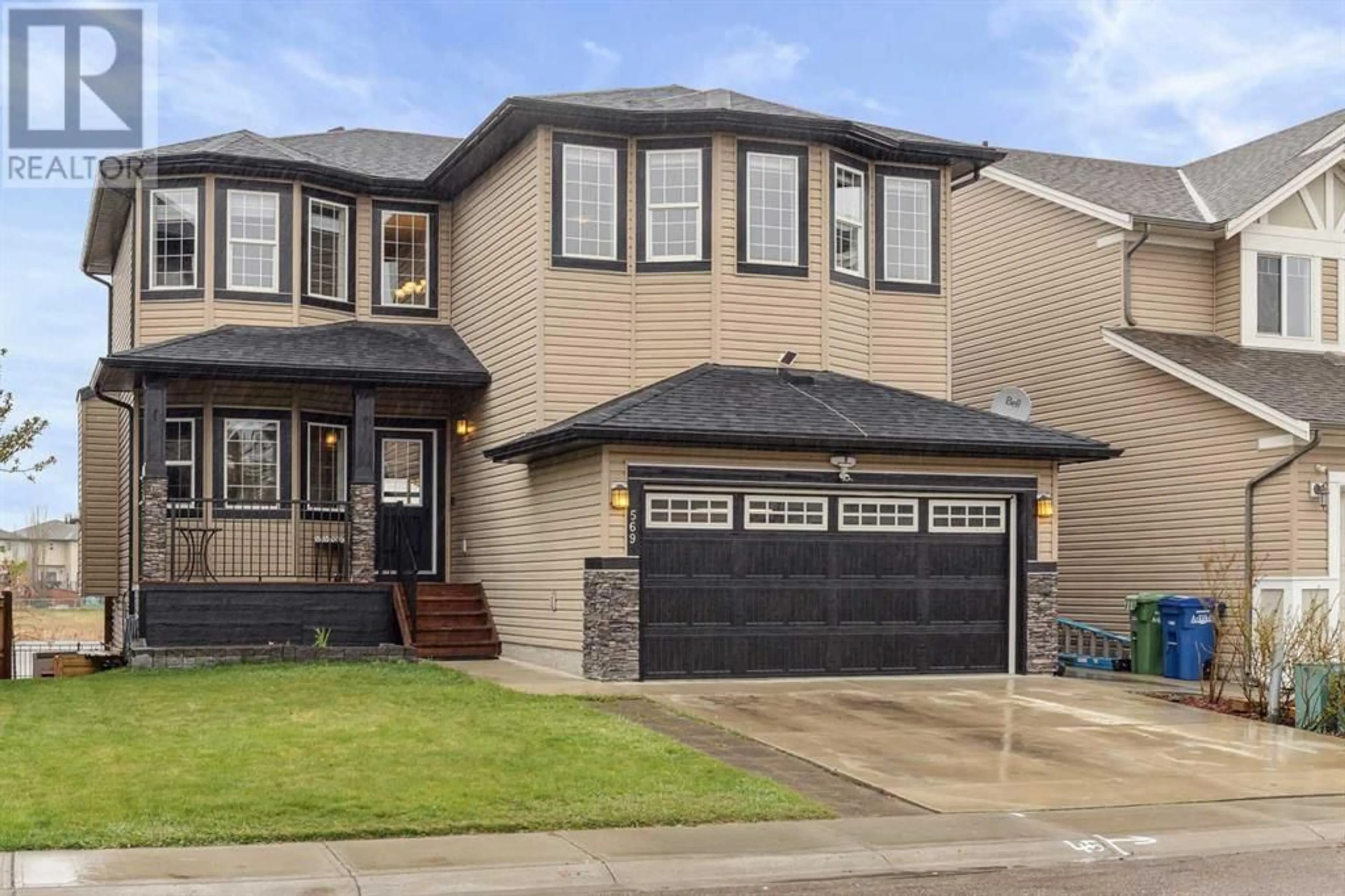 Frontside or backside of a home for 569 Luxstone Landing SW, Airdrie Alberta T4B0C7