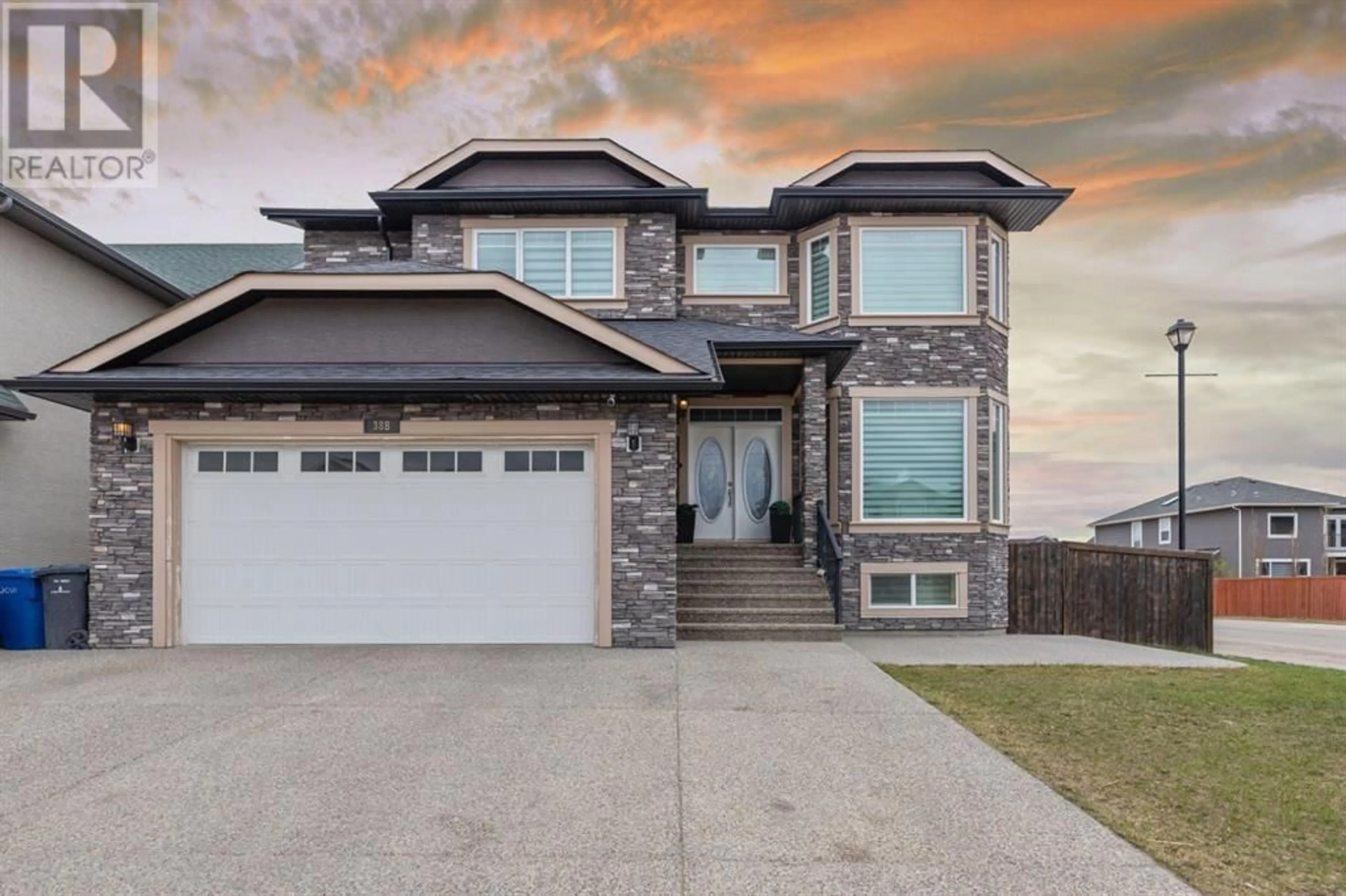 Frontside or backside of a home for 388 Kinniburgh Boulevard, Chestermere Alberta T1X0N3