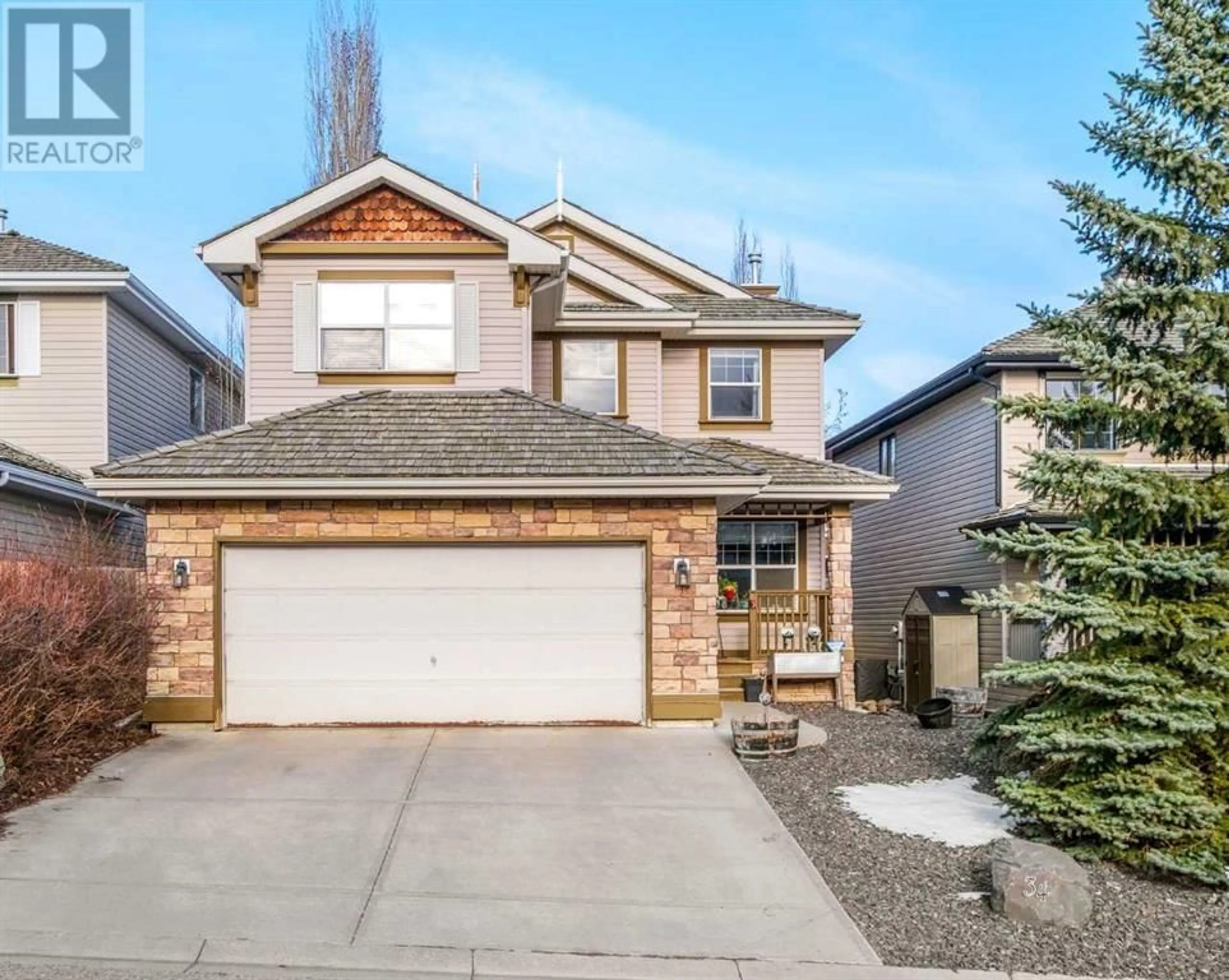 Frontside or backside of a home for 34 Springbank Rise SW, Calgary Alberta T3H4J6