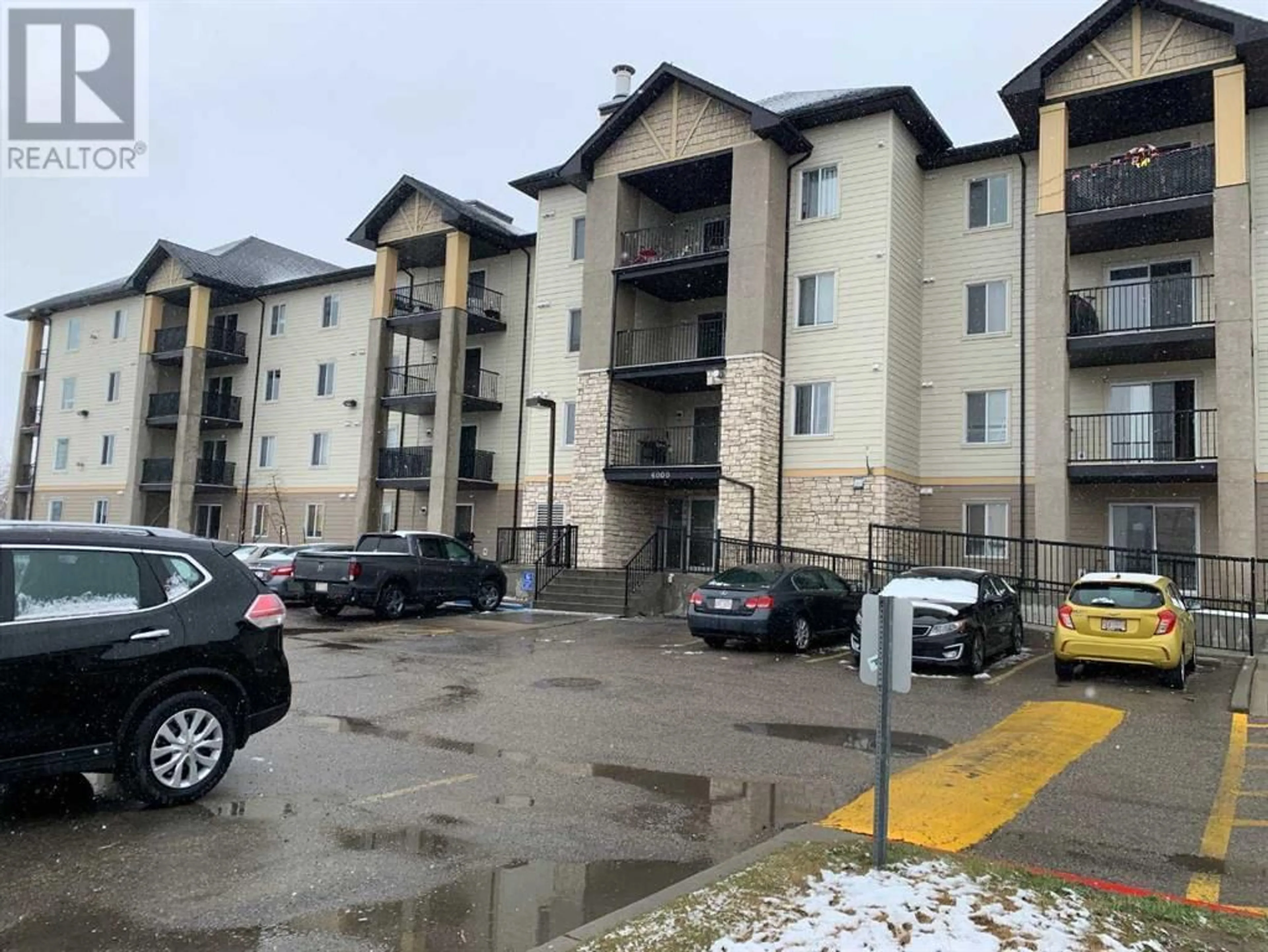 A pic from exterior of the house or condo for 6410 304 Mackenzie Way SW, Airdrie Alberta T4B3H6