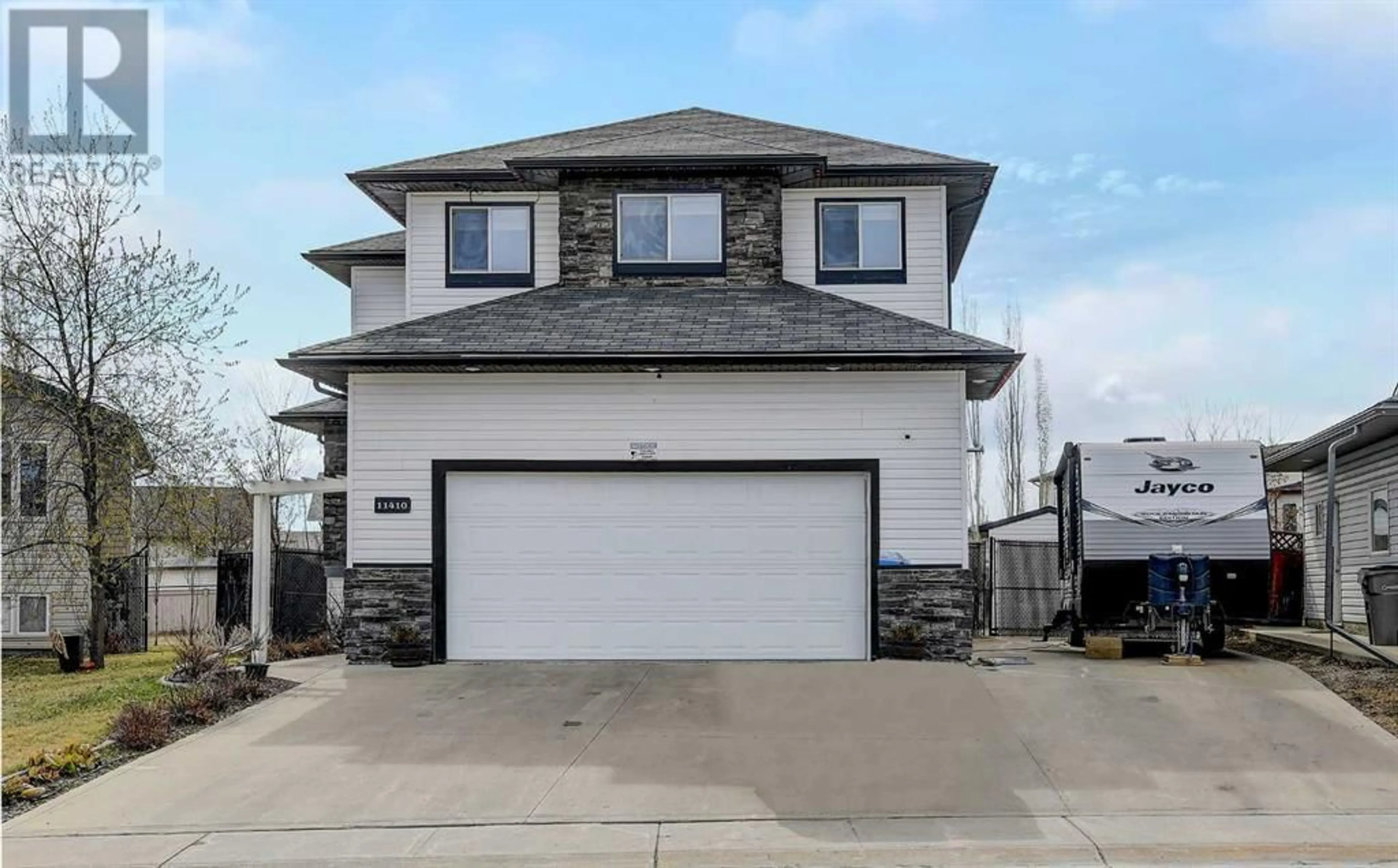 Frontside or backside of a home for 11410 89B Street, Grande Prairie Alberta T8X1T9