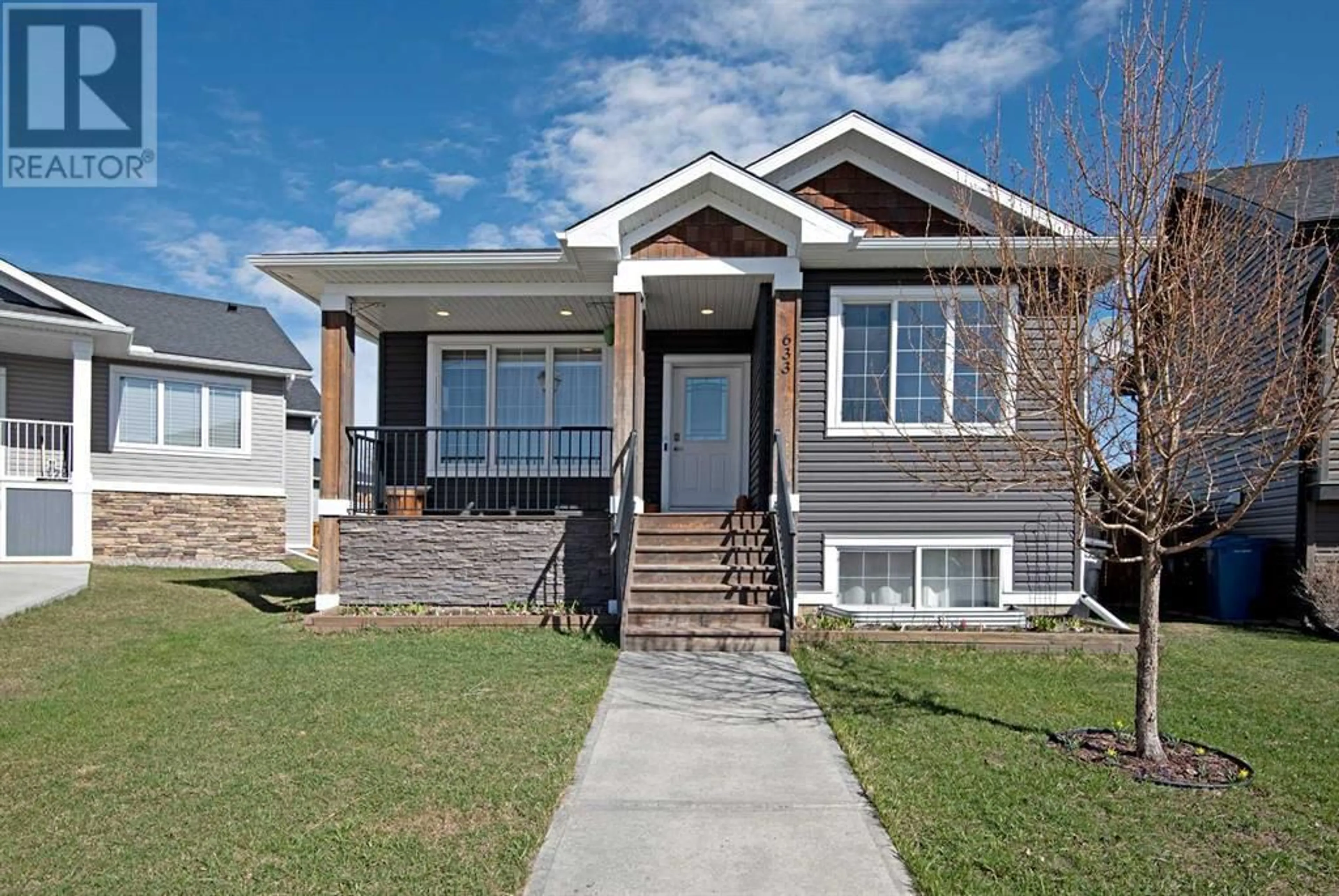 Frontside or backside of a home for 633 Country Meadows Close, Diamond Valley Alberta T0L2A0