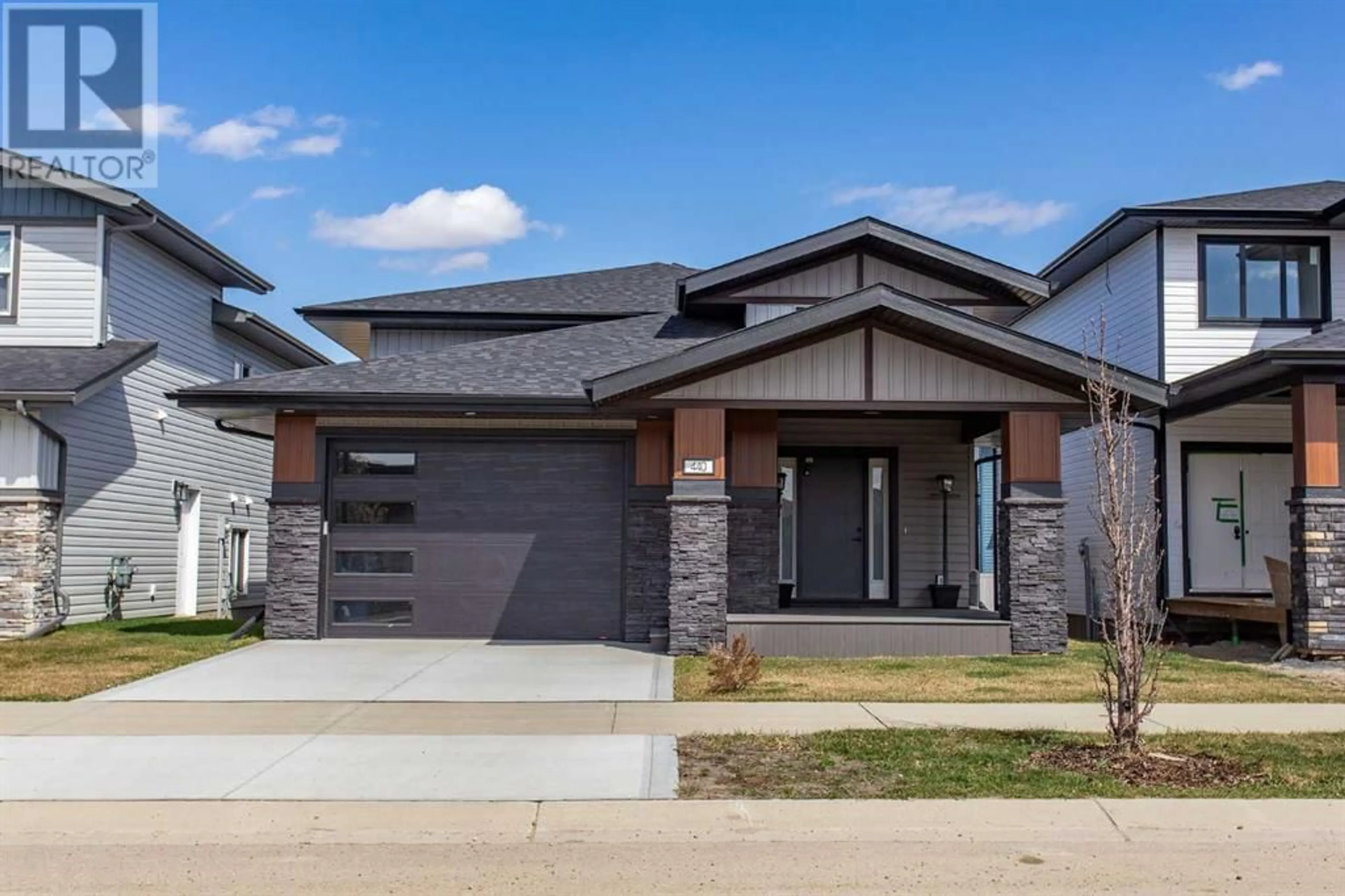Frontside or backside of a home for 440 Timberlands Drive, Red Deer Alberta T4P0Y6