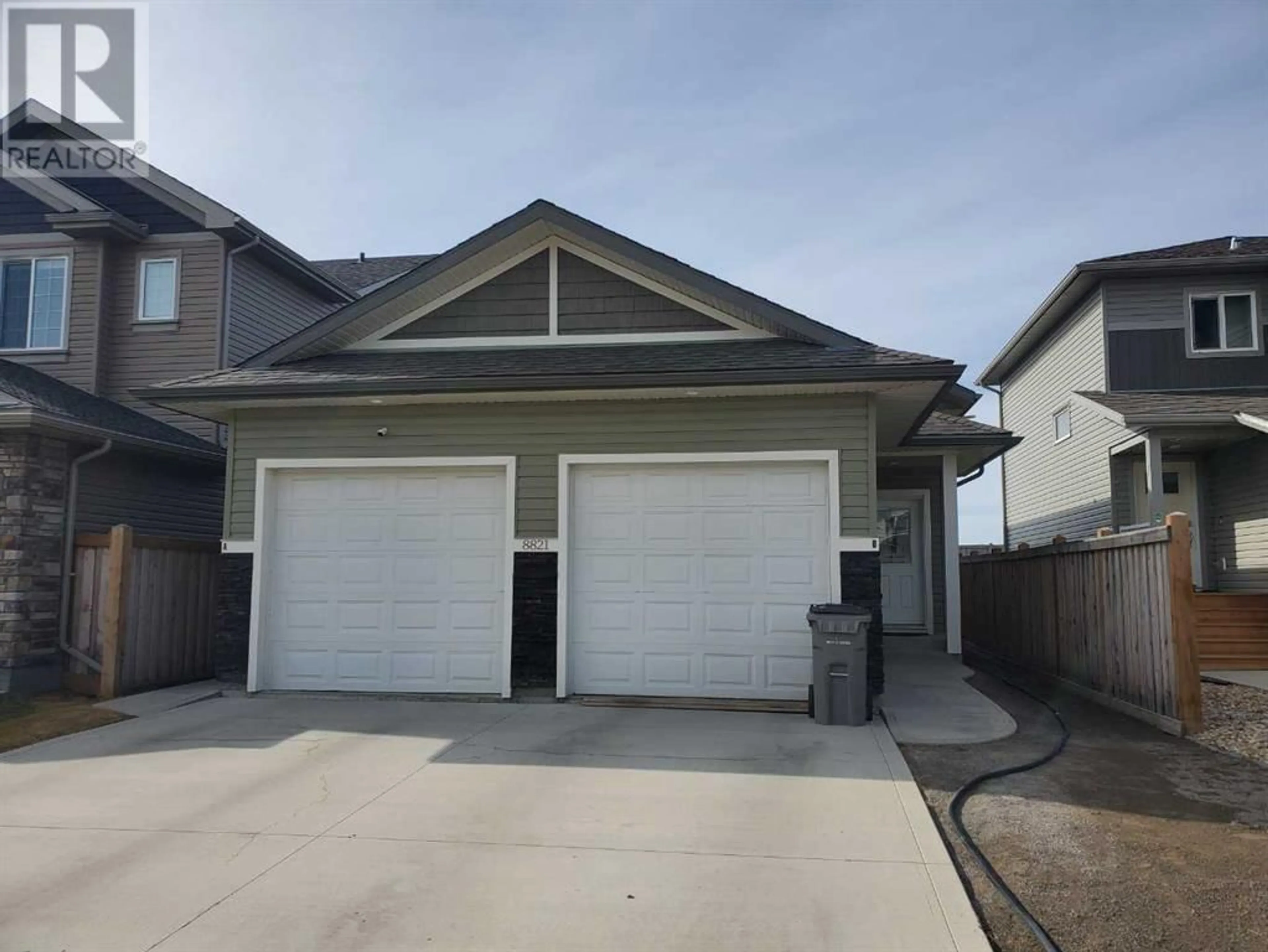 Frontside or backside of a home for 8821 85a Street, Grande Prairie Alberta T8X0R4