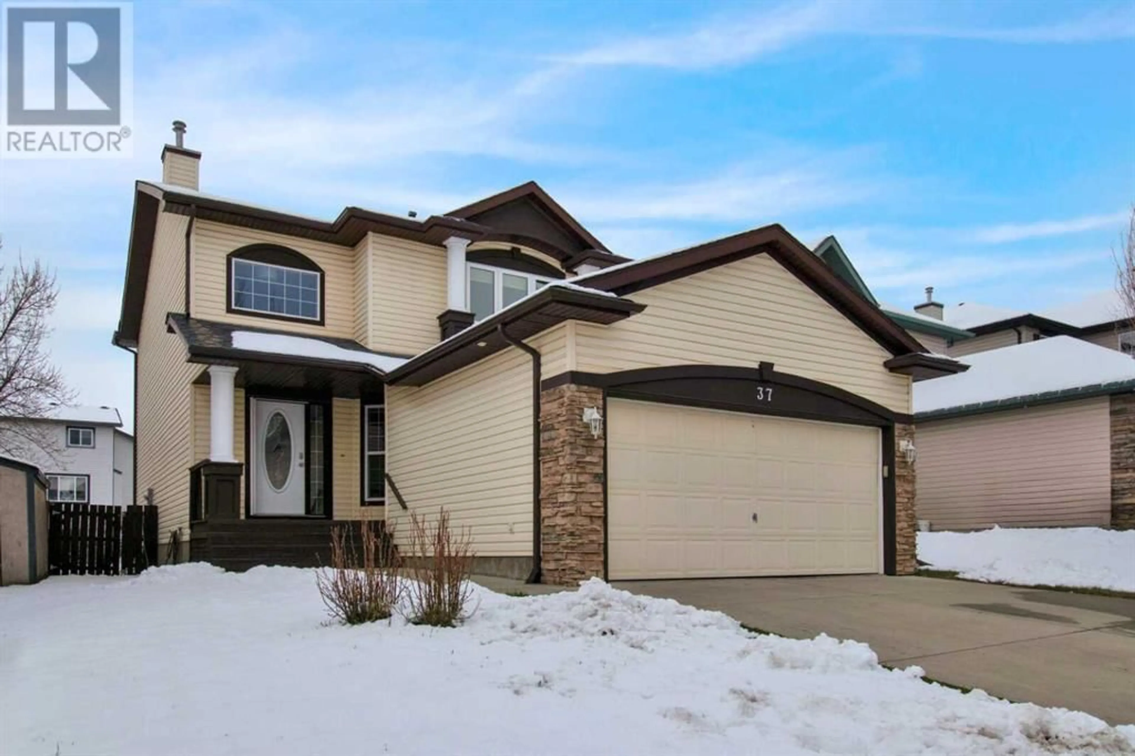 Frontside or backside of a home for 37 Crystalridge Crescent, Okotoks Alberta T1S1V1