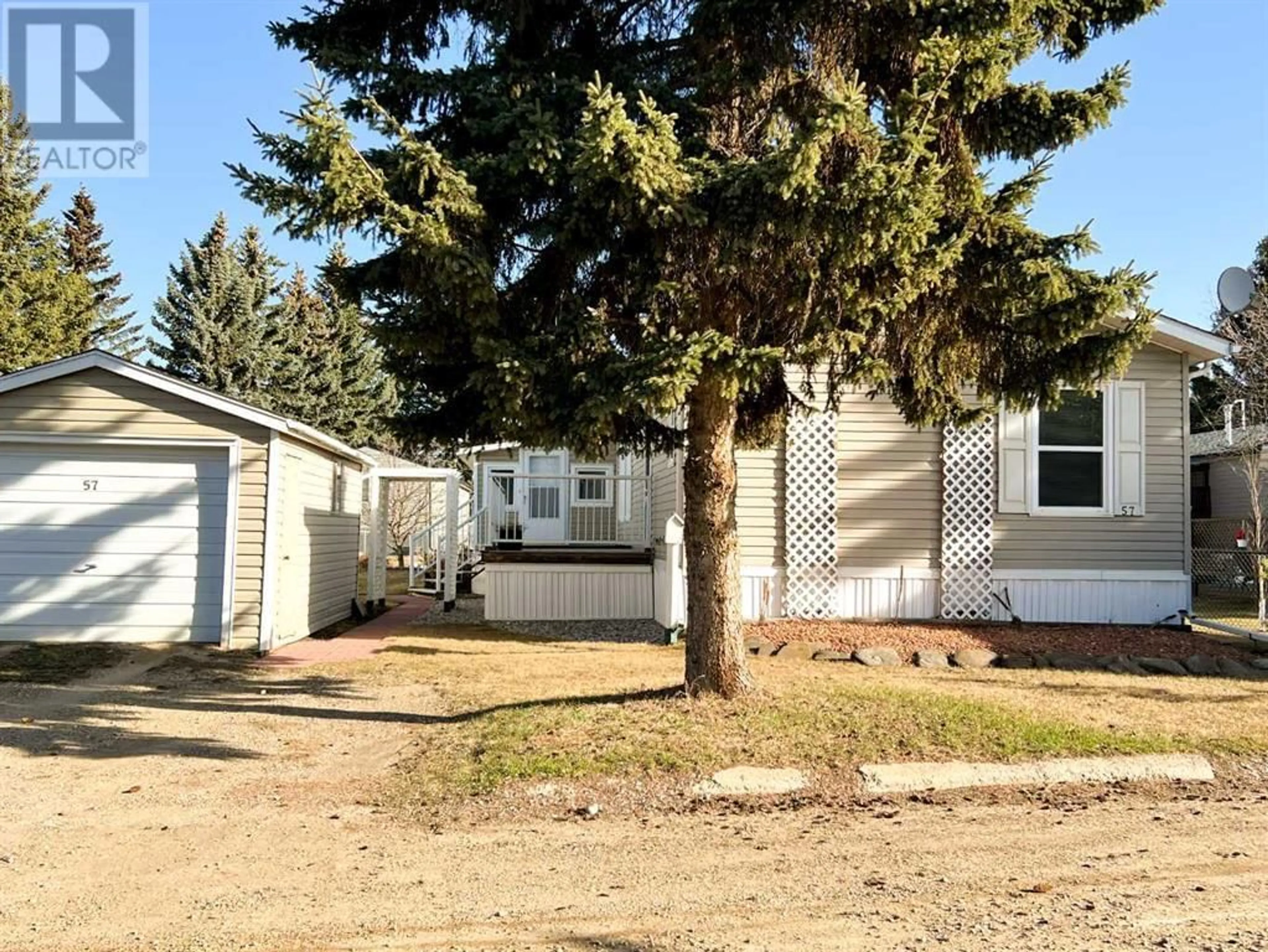 A pic from exterior of the house or condo for 57 6205 54 Street, Ponoka Alberta T4J1M5