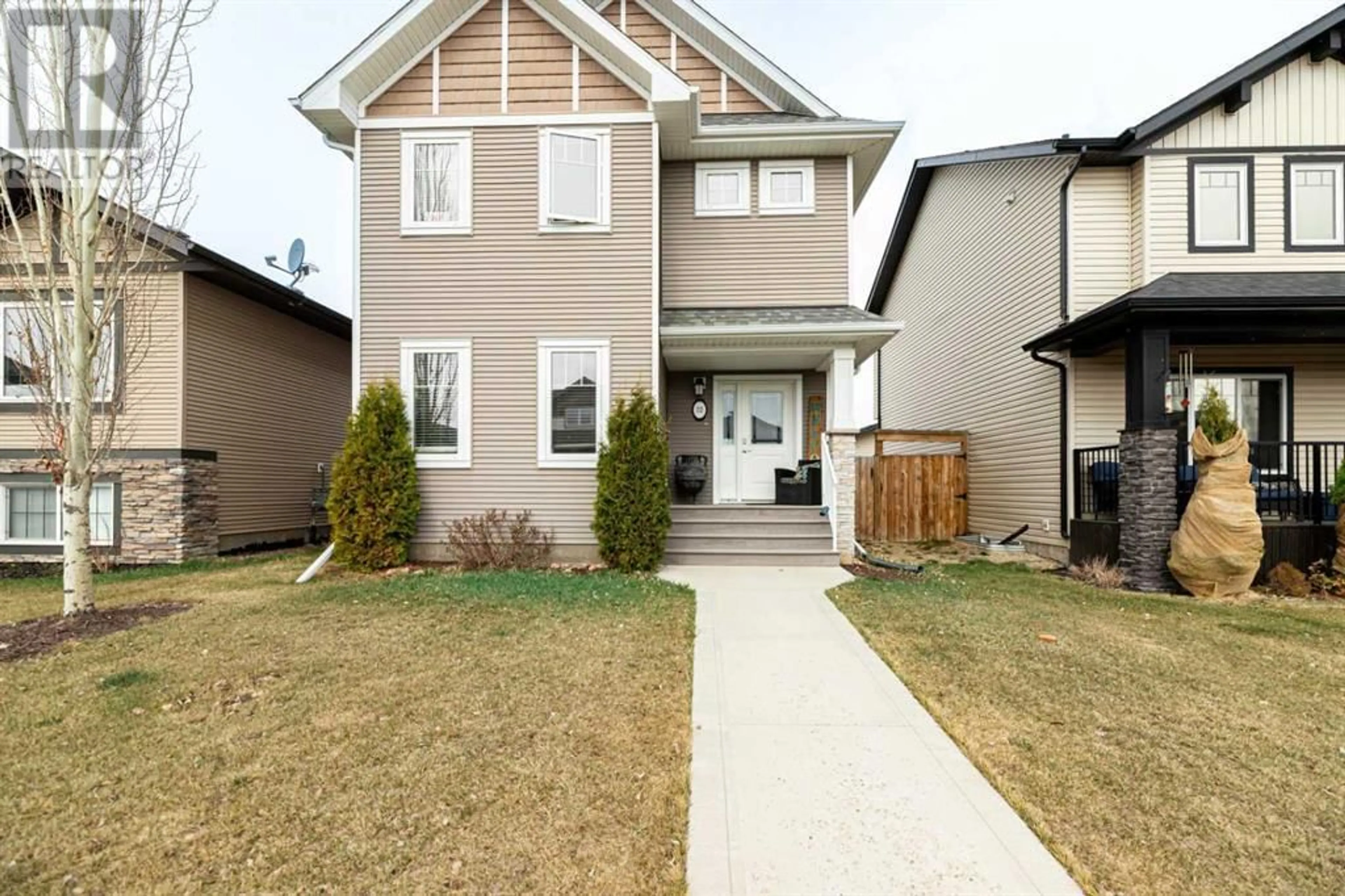 Frontside or backside of a home for 22 Richfield Crescent, Sylvan Lake Alberta T4S0L1