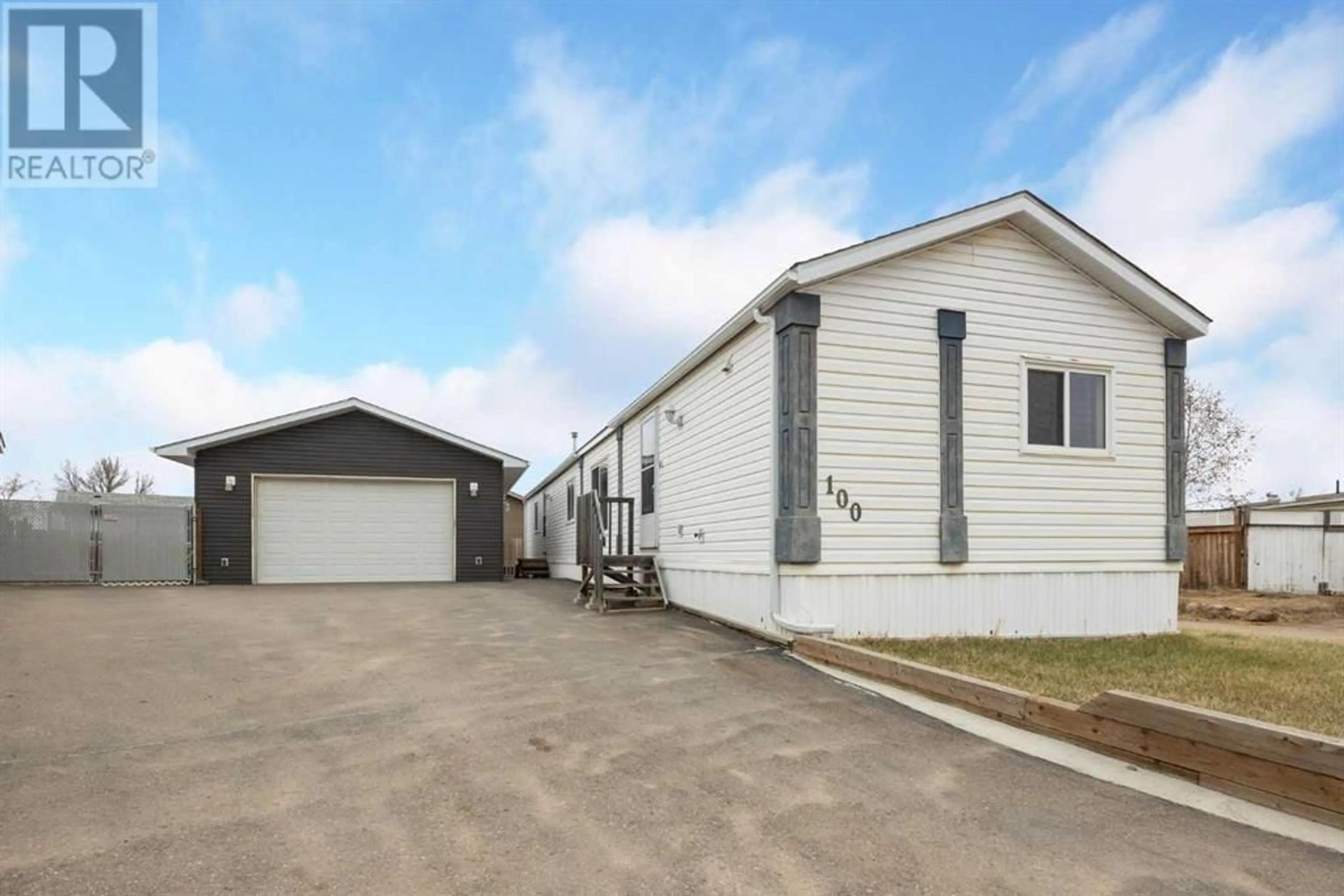Frontside or backside of a home for 100 Grey Owl Place SW, Fort McMurray Alberta T9H2P1