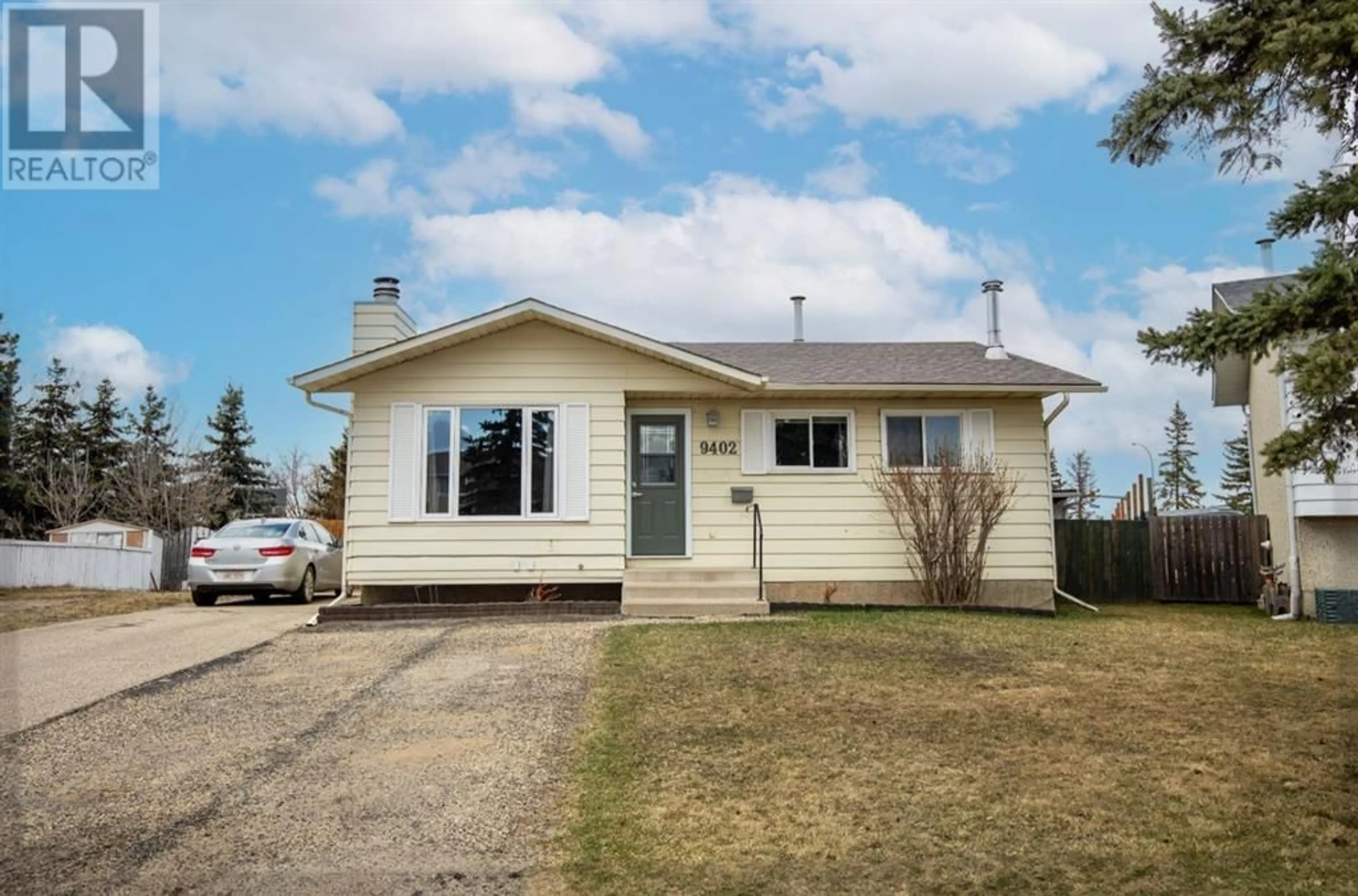 Frontside or backside of a home for 9402 80 Avenue, Grande Prairie Alberta T8V5J4