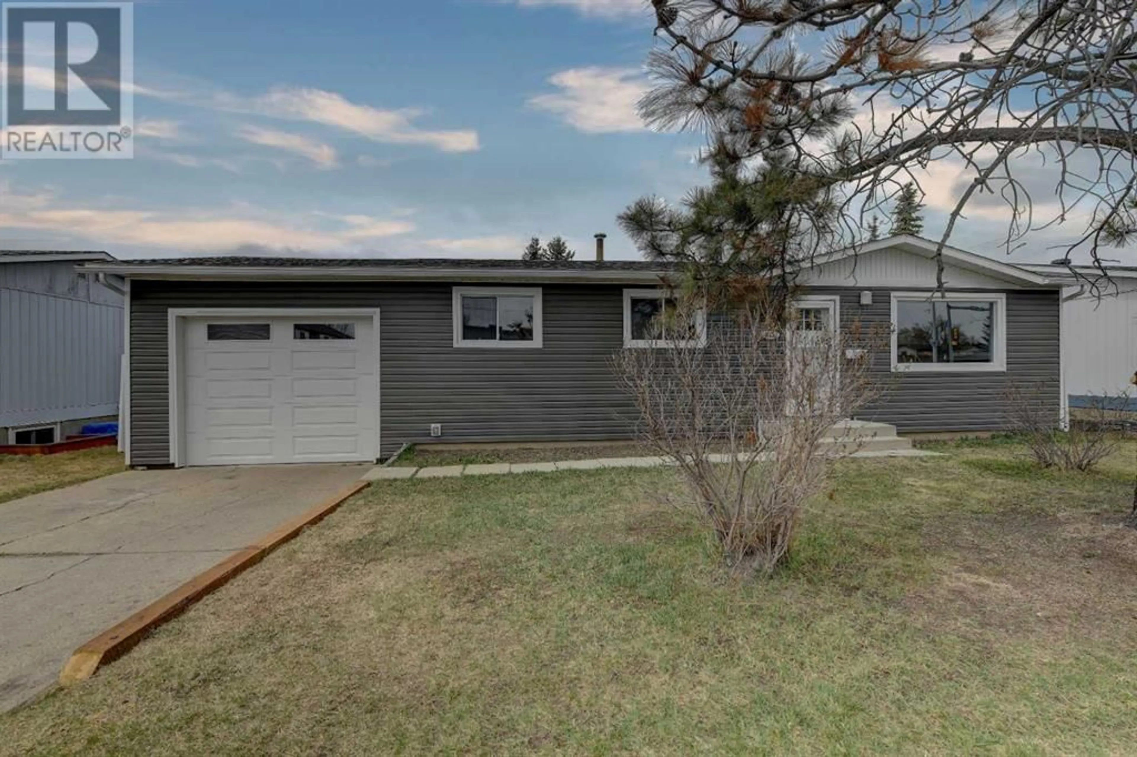 Home with vinyl exterior material for 11430 96 Street, Grande Prairie Alberta T8V2A5