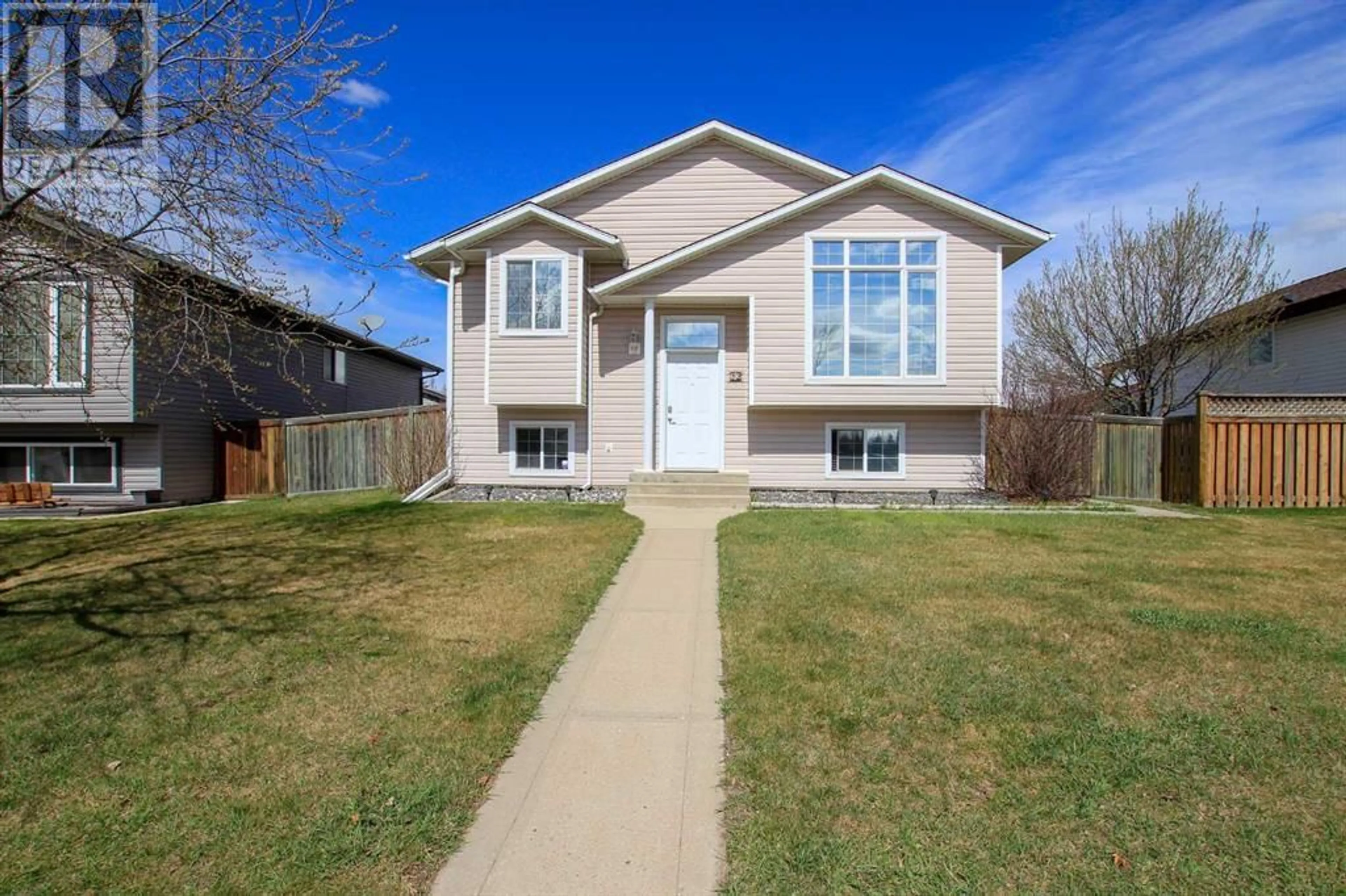 Frontside or backside of a home for 12 Oak Drive, Red Deer Alberta T4P3T3