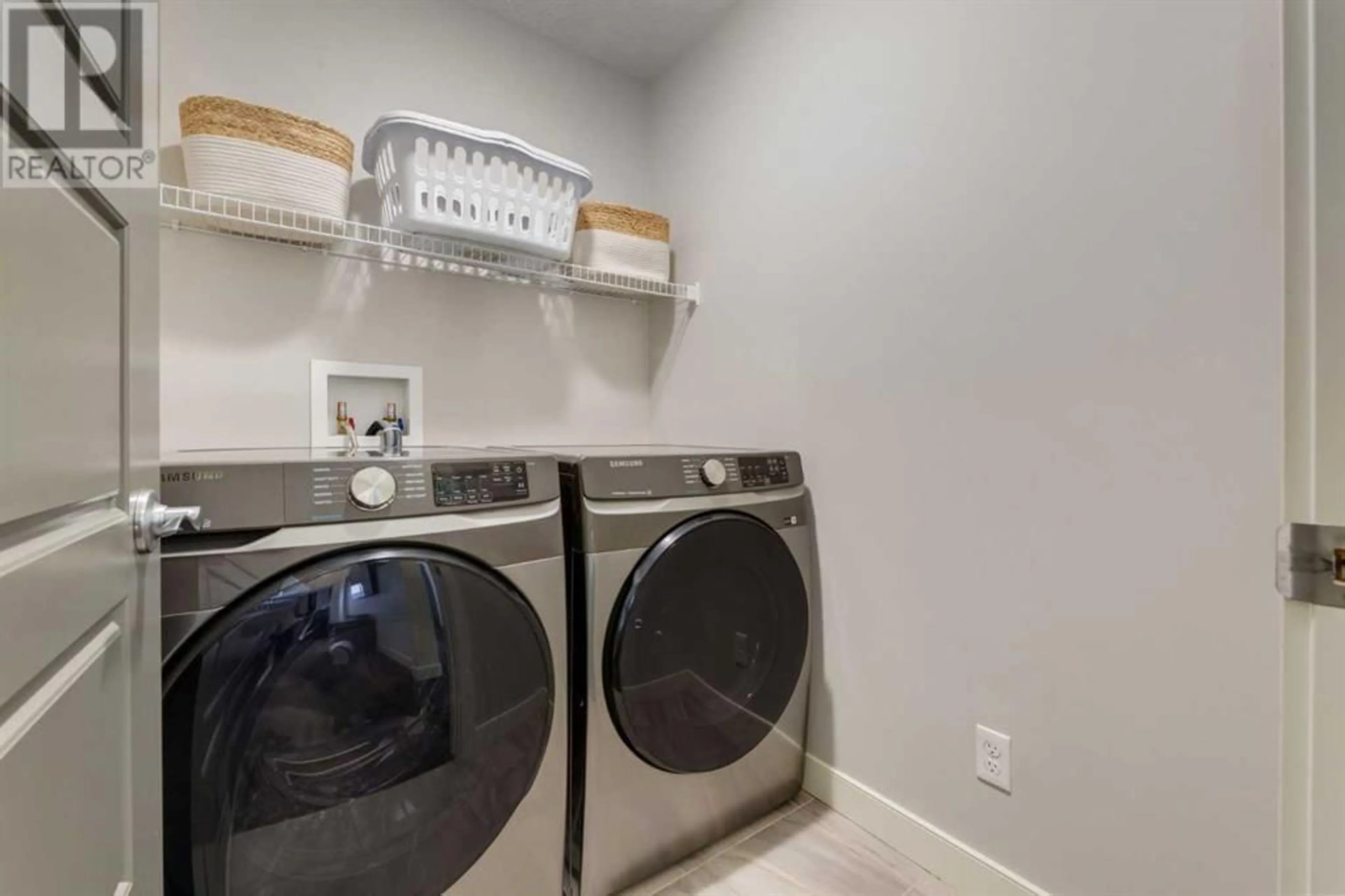 Laundry room for 41 Ravenskirk Close SE, Airdrie Alberta T4A0S9